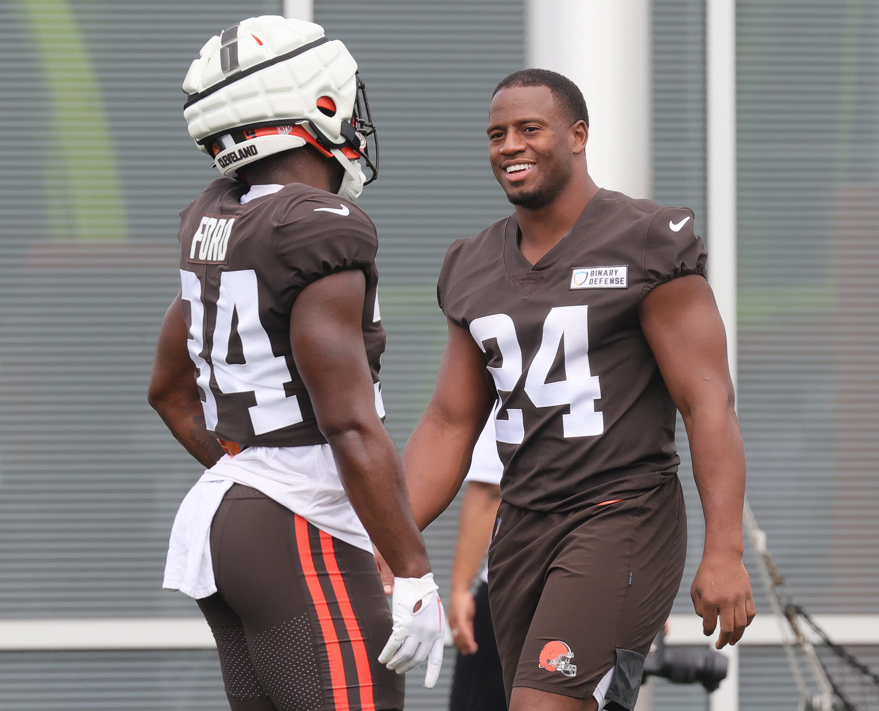 Cleveland Browns cornerback Caleb Biggers celebrates after