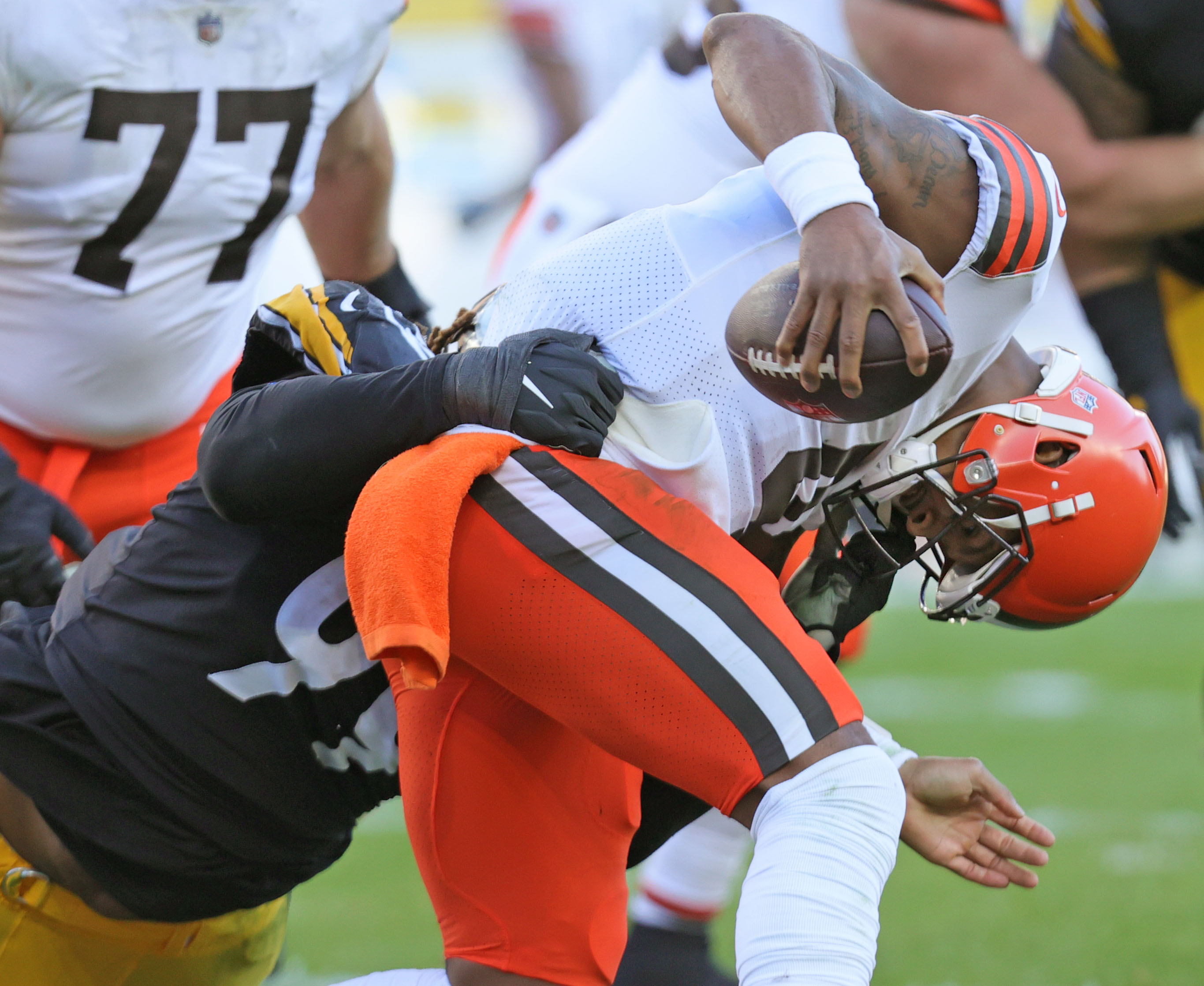 Josh Sweat sacks the Browns' Deshaun Watson in joint practice as