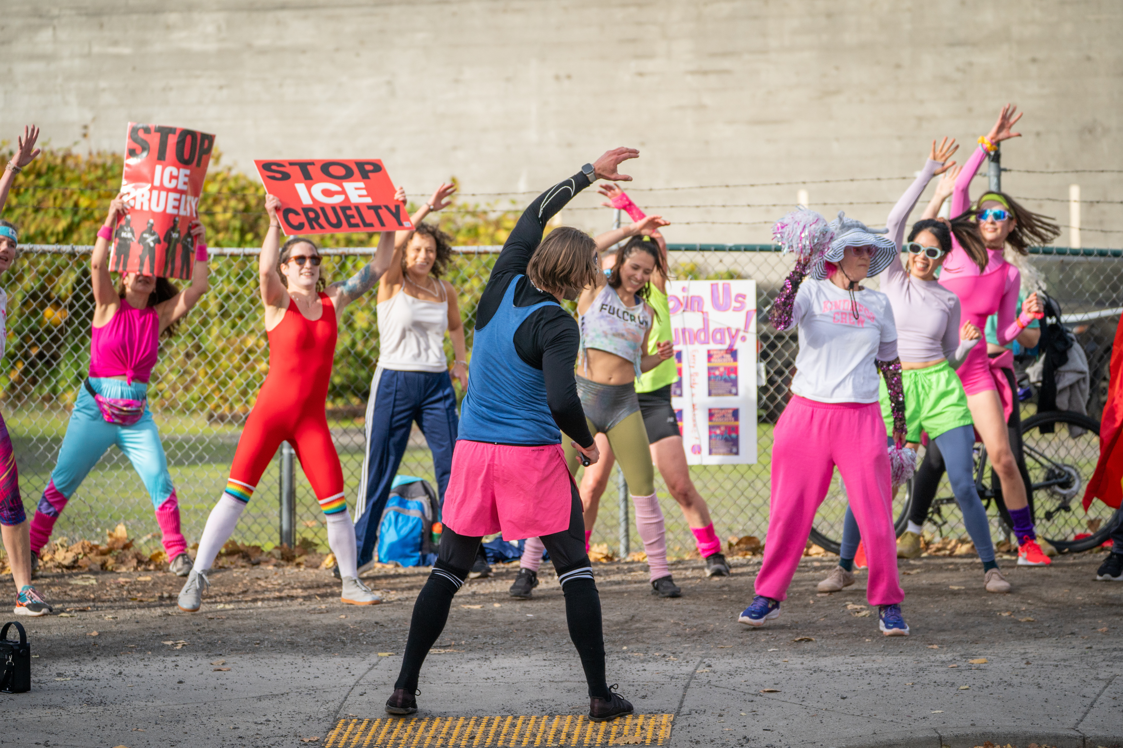 Participants in Fulcrum Fitness’s “Sweatin’ Out the Fascists” held an ’80s-aerobics peaceful protest outside the U.S. Immigration and Customs Enforcement (ICE) facility in South Portland on Sunday, Nov. 9, 2025, collecting donations for the Oregon Food Bank.