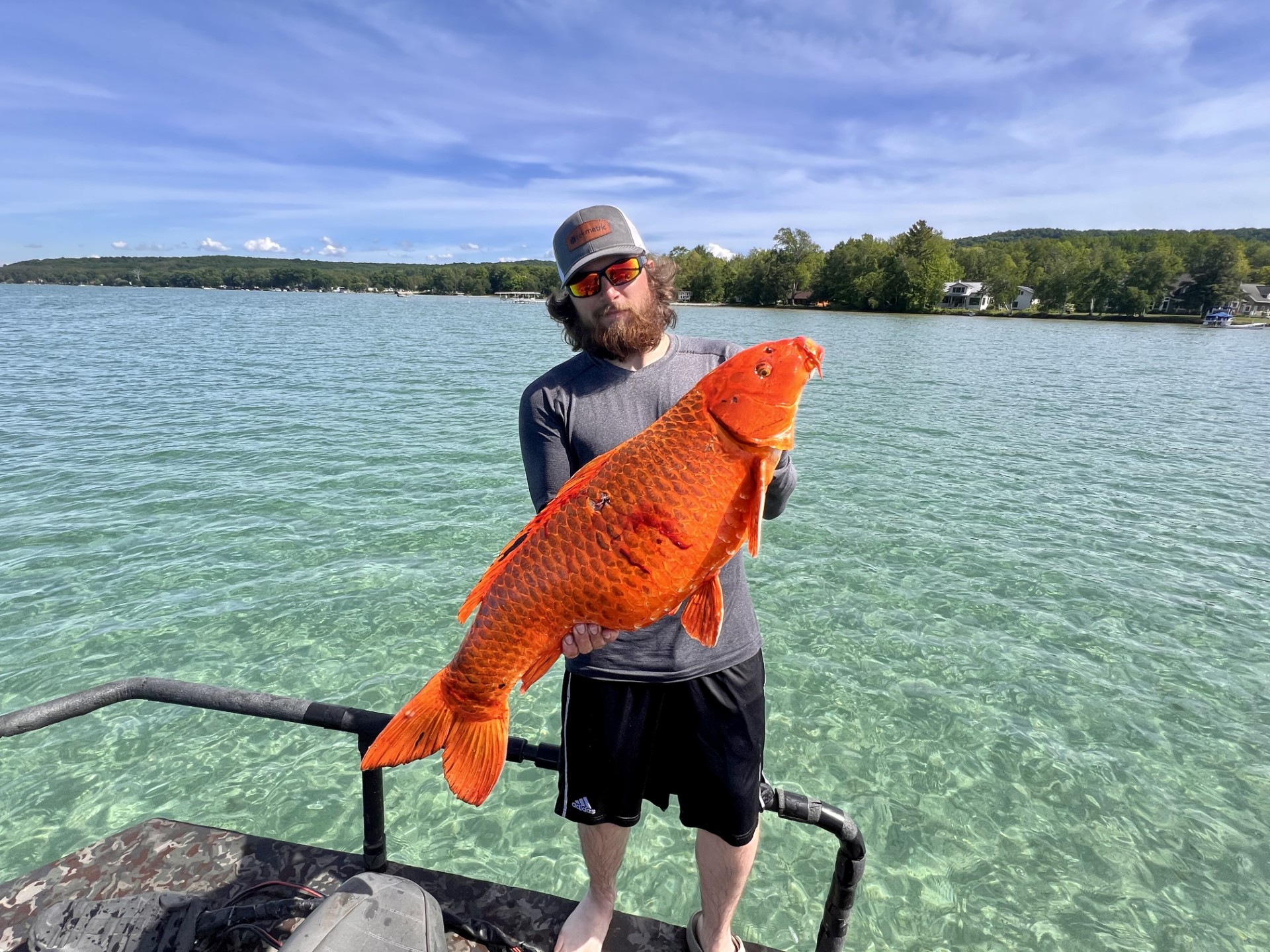 Bowfishers remove invasive koi from Glen Lake - mlive.com