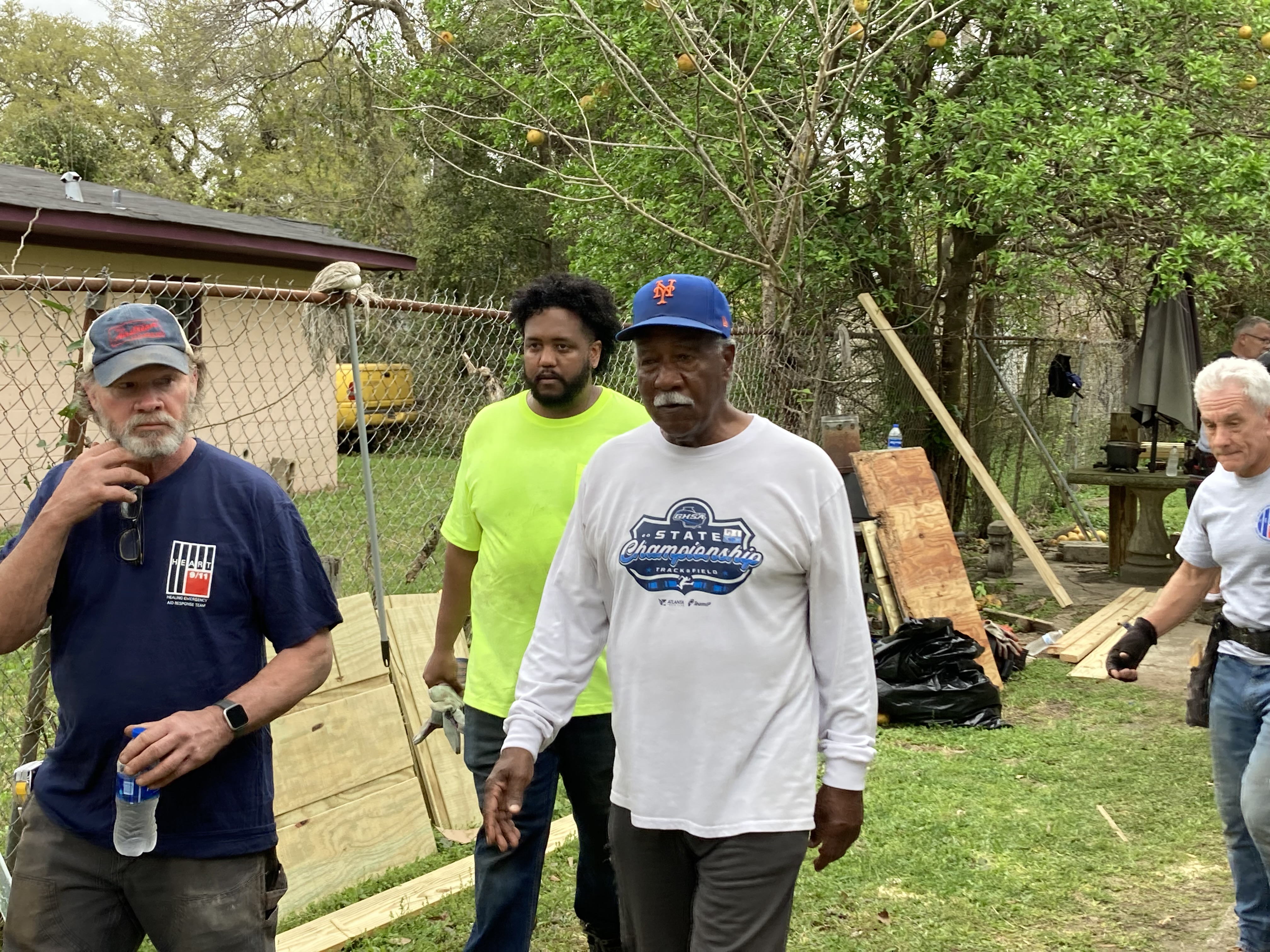 Hank Aaron's childhood home wheels through Mobile streets to new location