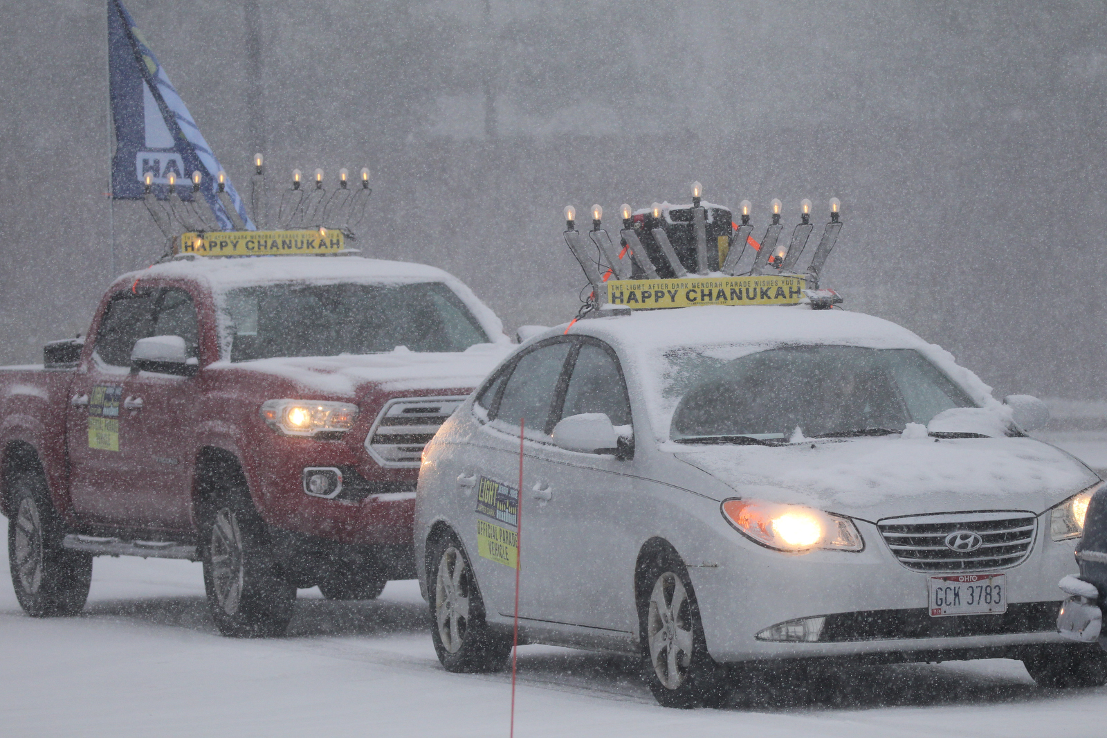 Menorahtopped cars parade through Cleveland eastern suburbs