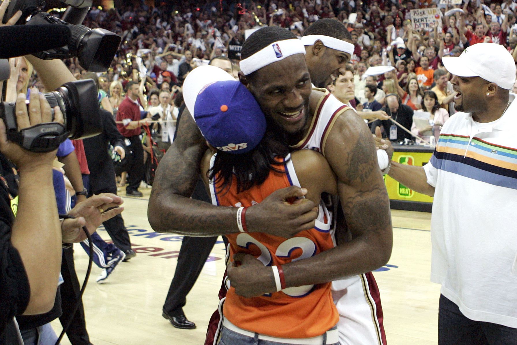 Cleveland Cavaliers' LeBron James hugs mom Gloria James after defeating the Detroit Pistons in six games for the Eastern Conference Championship Saturday, June 02, 2007 at Quicken Loans Arena in Cleveland.  (Joshua Gunter/The Plain Dealer)
