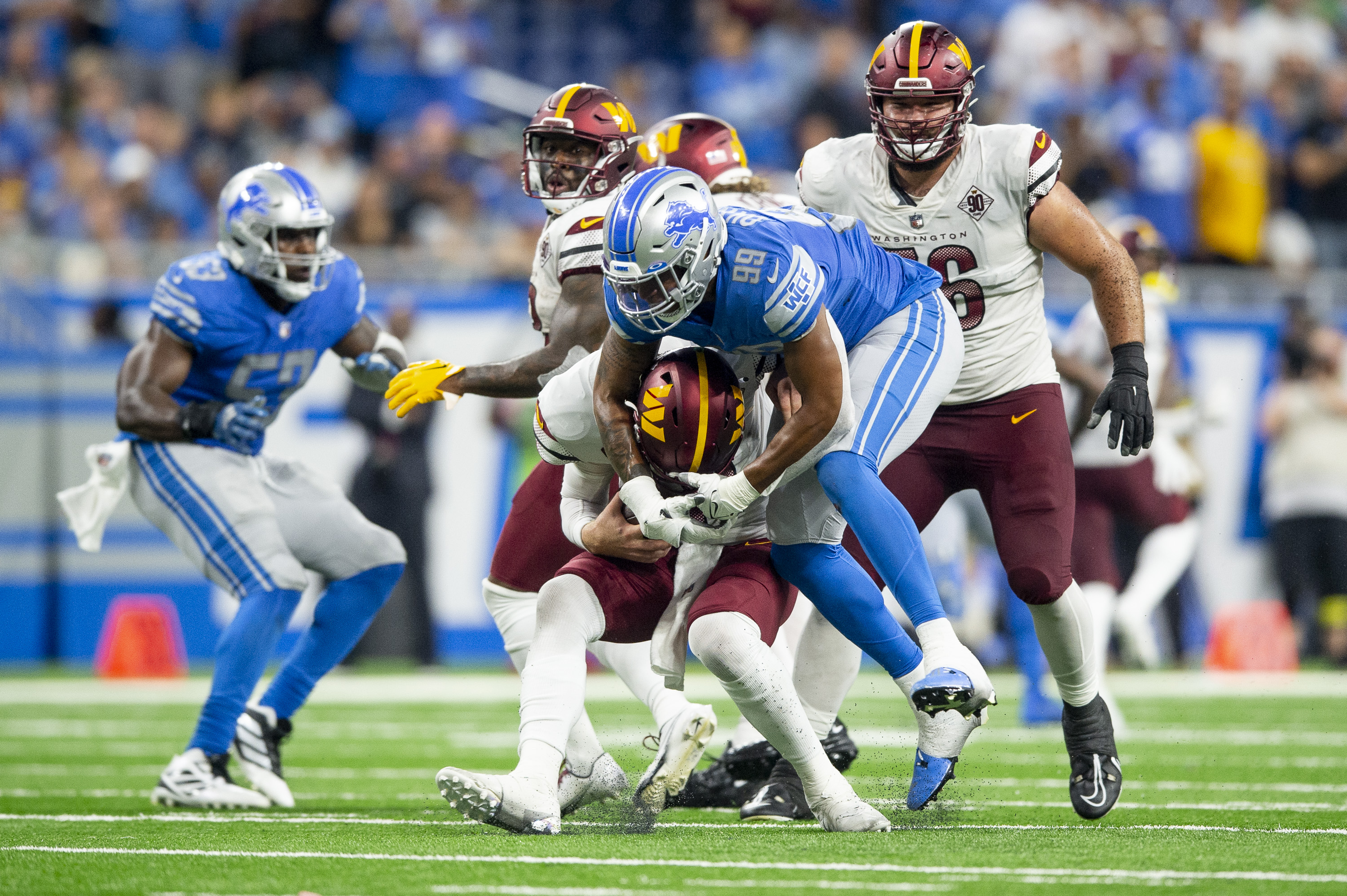 Detroit Lions linebacker Julian Okwara (99) pursues a play on defense  against the Jasksonville Jaguars during an NFL pre-season football game,  Saturday, Aug. 19, 2023, in Detroit. (AP Photo/Rick Osentoski Stock Photo 