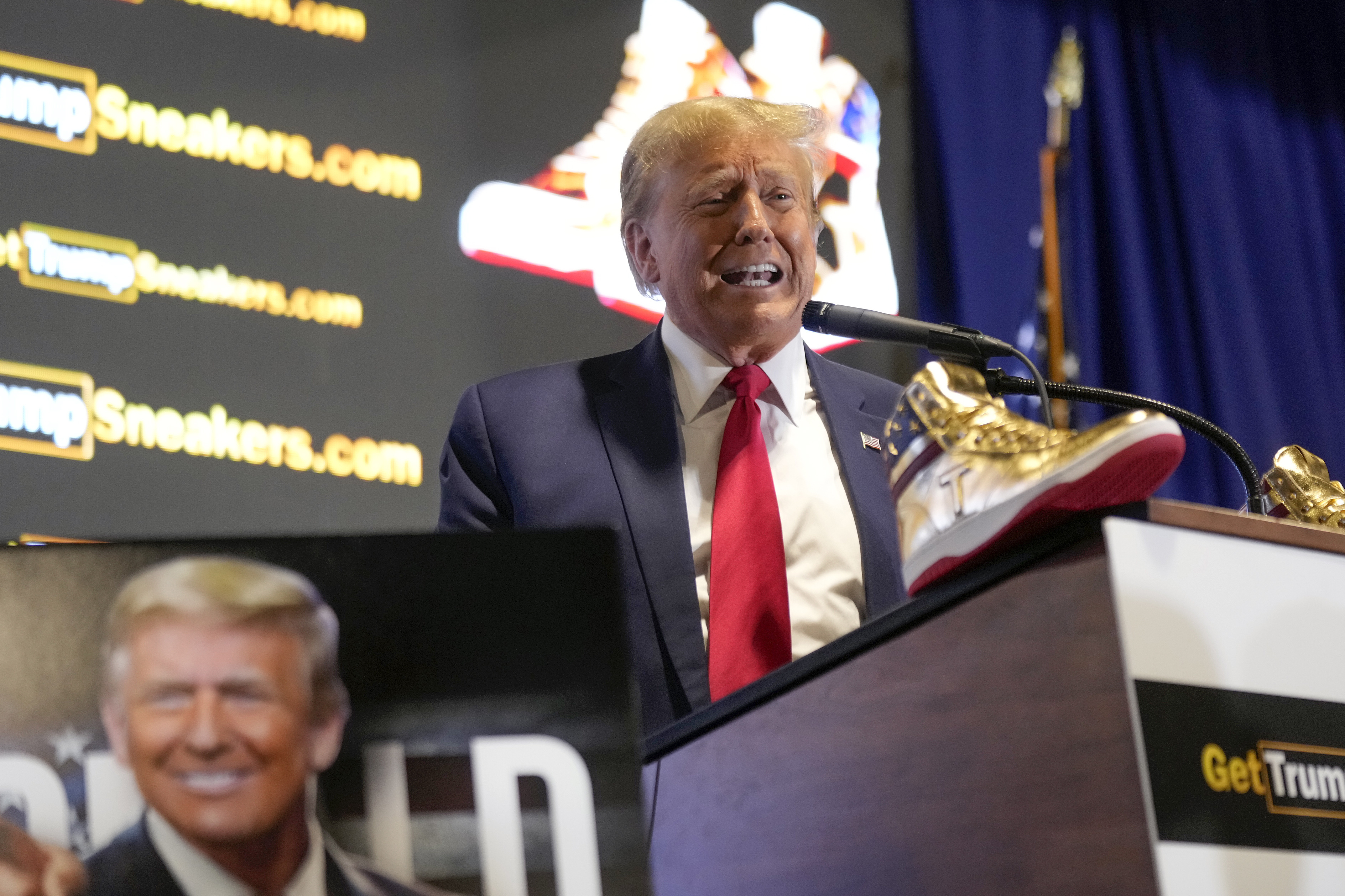 Trump booed as he hawks $399 'Never Surrender' shoes at