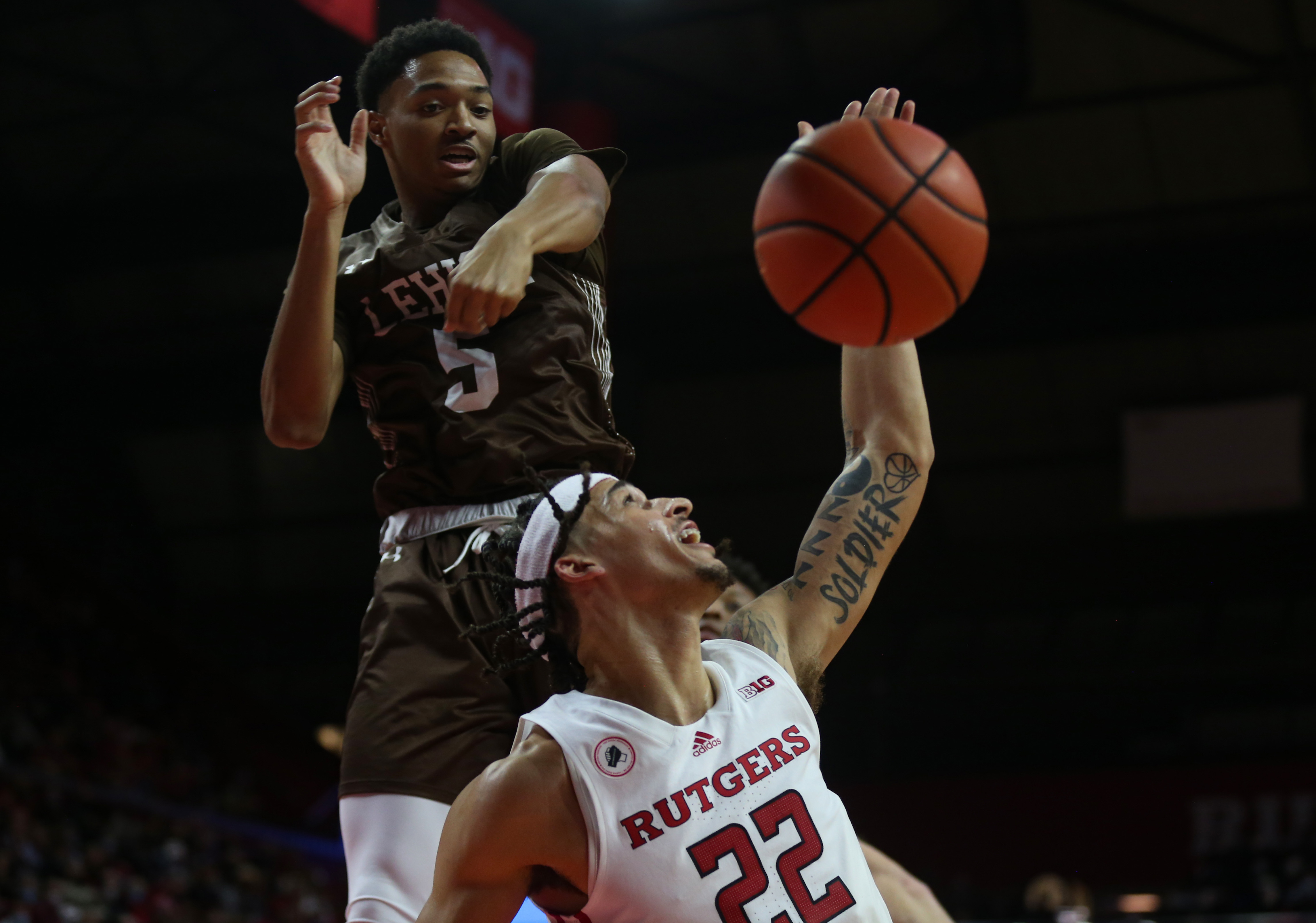 Piscataway, New Jersey, USA. 30th Dec, 2021. Rutgers Scarlet Knights guard  Caleb McConnell (22) during the game between the Maine Black Bears and the  Rutgers Scarlet Knights at Jersey MikeÕs Arena in