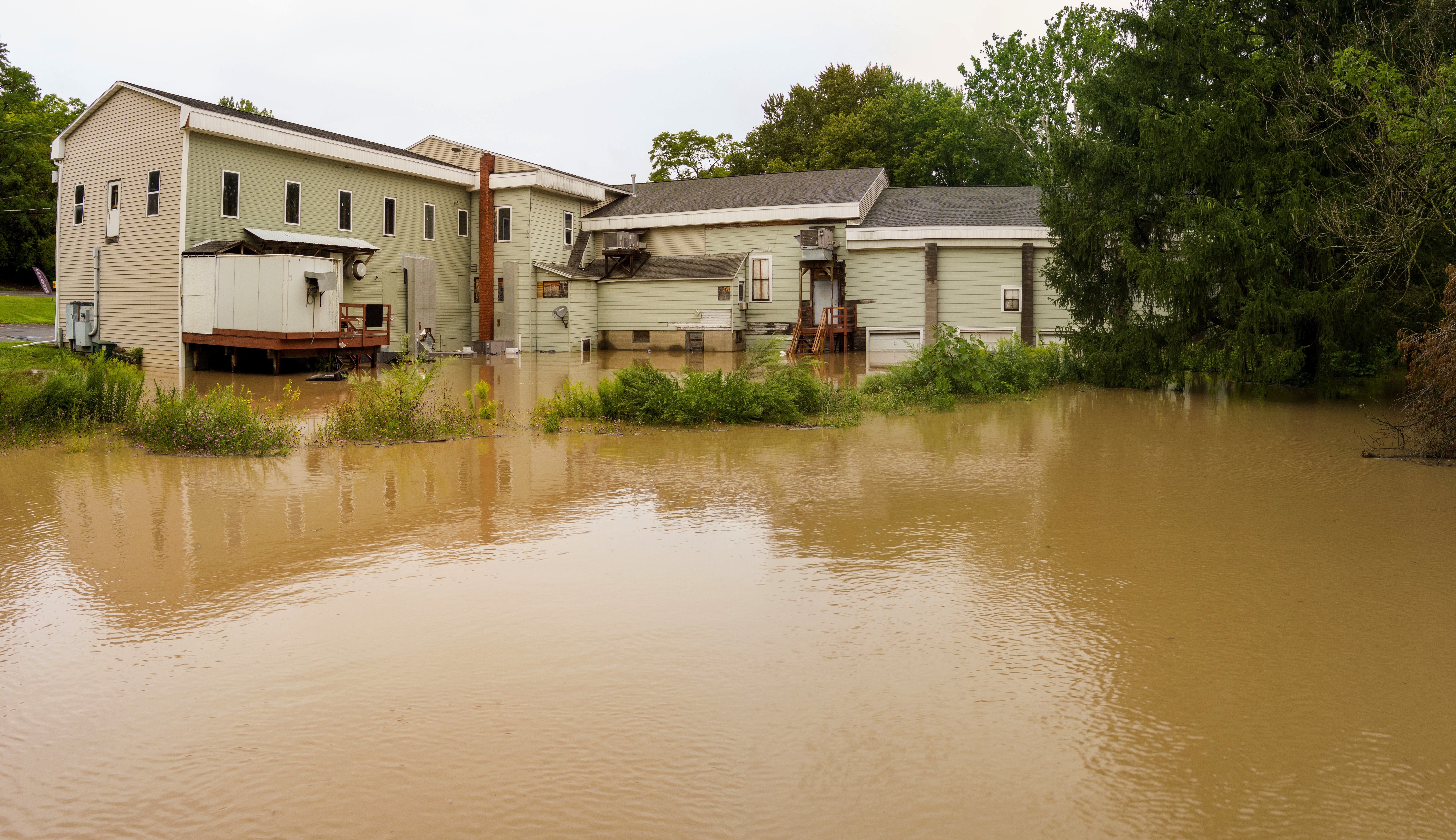 A view of TK Tavern in the Village of Camillus where Nine Mile Creek flooded the downtown area August 19, 2021, after heavy rainfall.