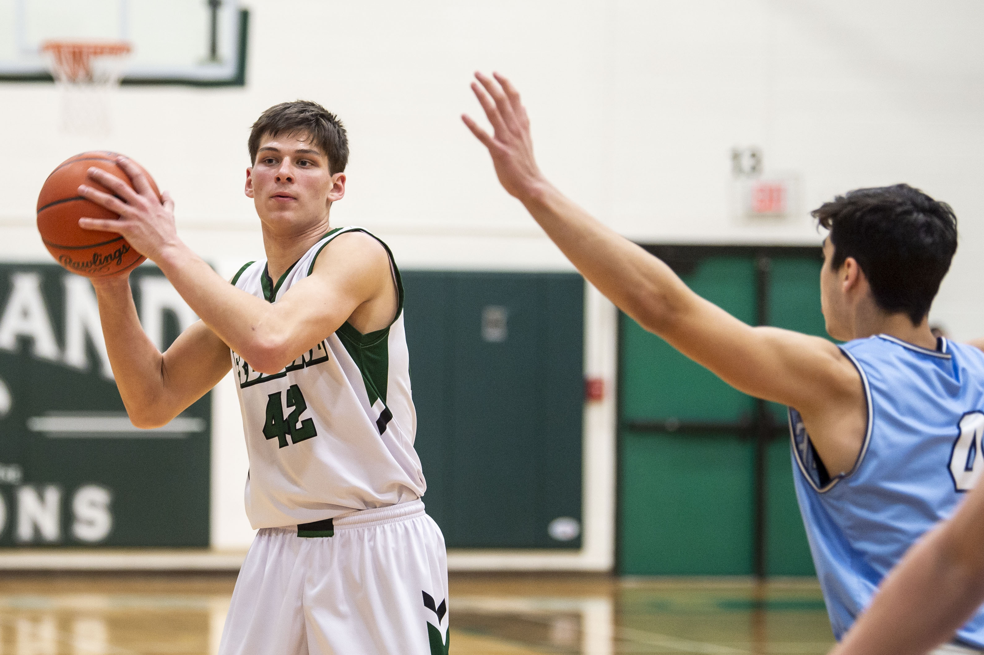 Freeland boys basketball takes down Garber in championship game