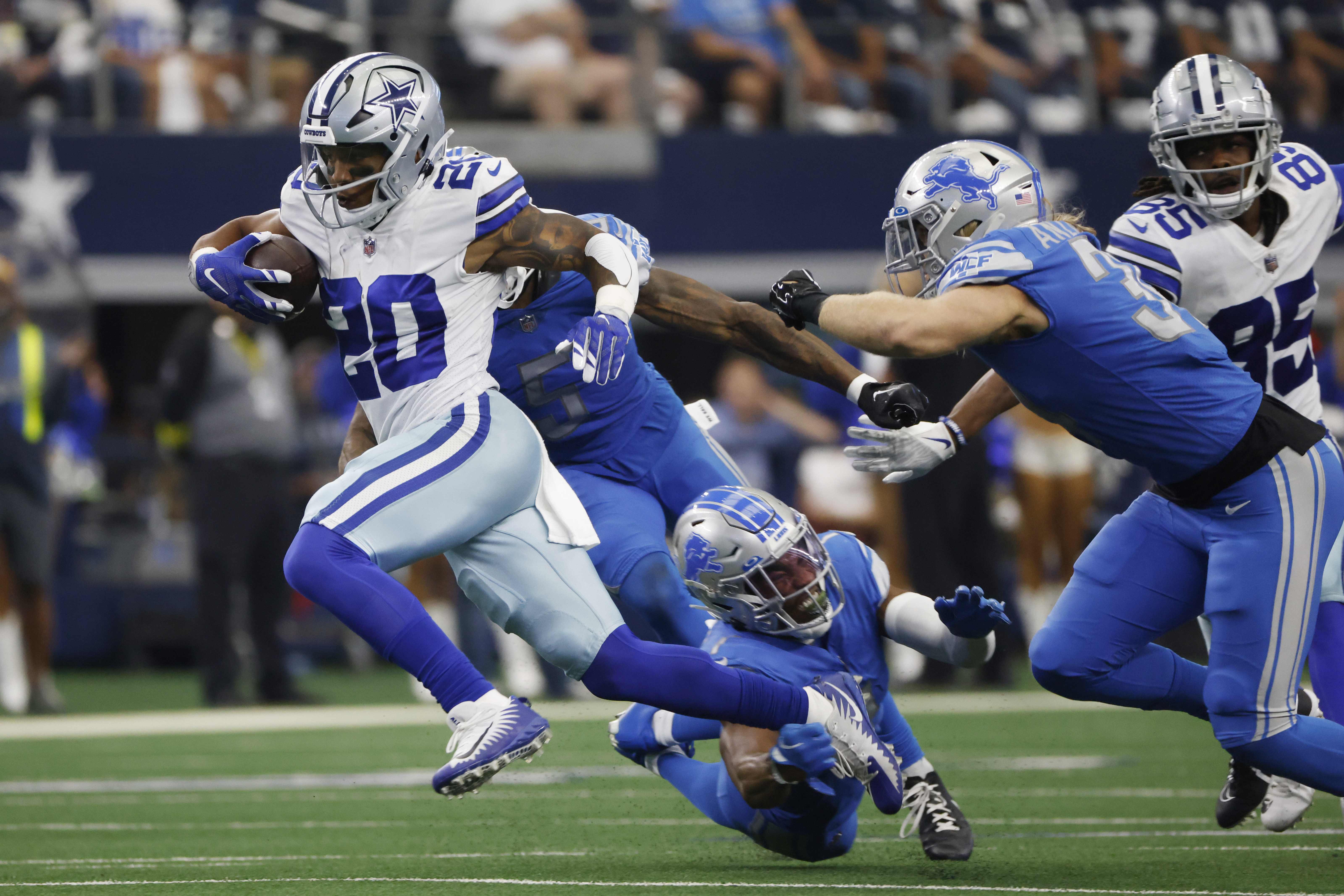 ARLINGTON, TX - OCTOBER 23: Detroit Lions safety DeShon Elliott (5) warms  up before the game between the Dallas Cowboys and the Detroit Lions on  October 23, 2022 at AT&T Stadium in