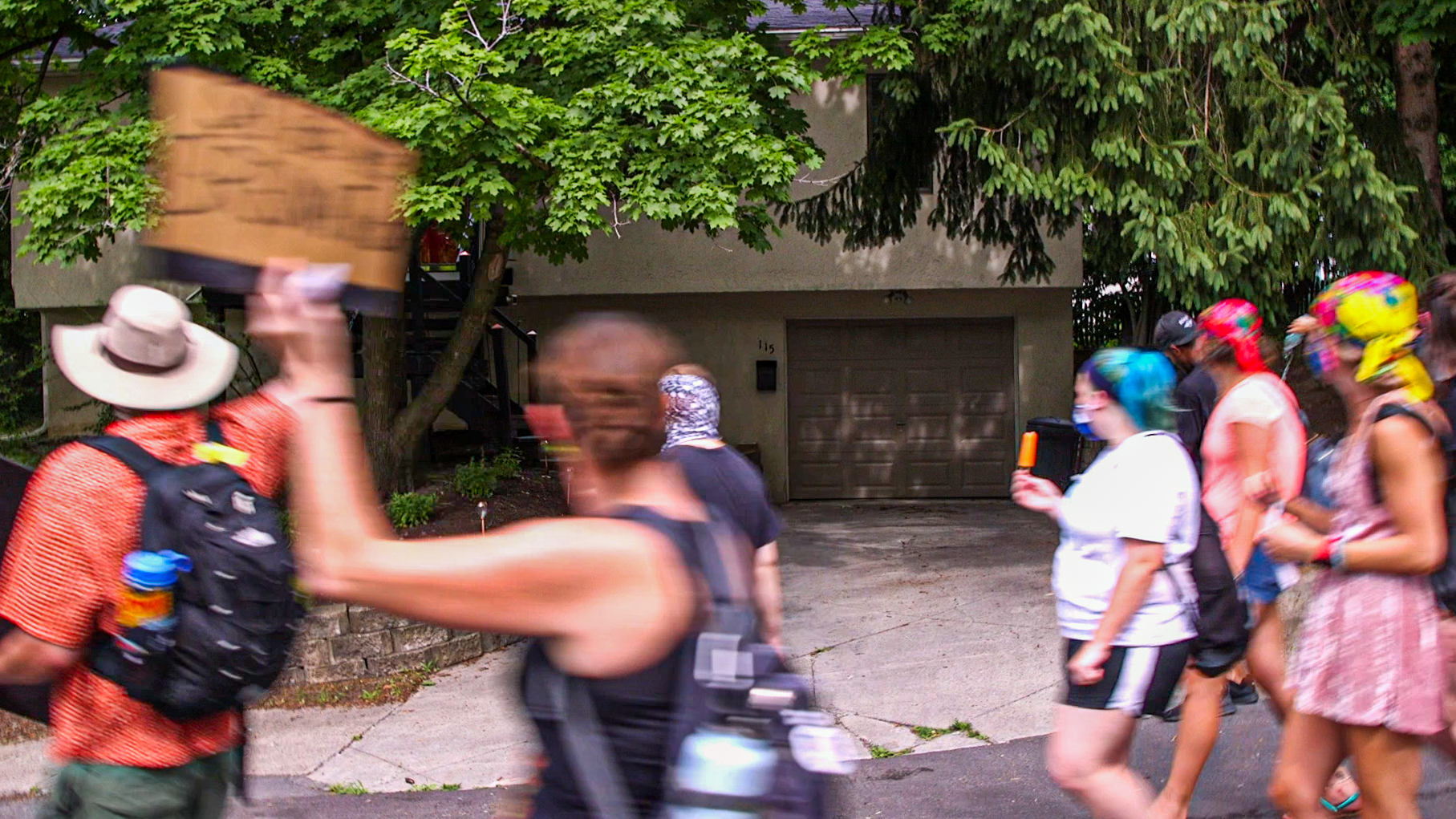 Protesters march by Mayor Ben Walsh's home in the Strathmore Neighborhood Friday, July 10, 2020 for the last day of the 40 + day and night peace march against police brutality and the death of George Floyd.