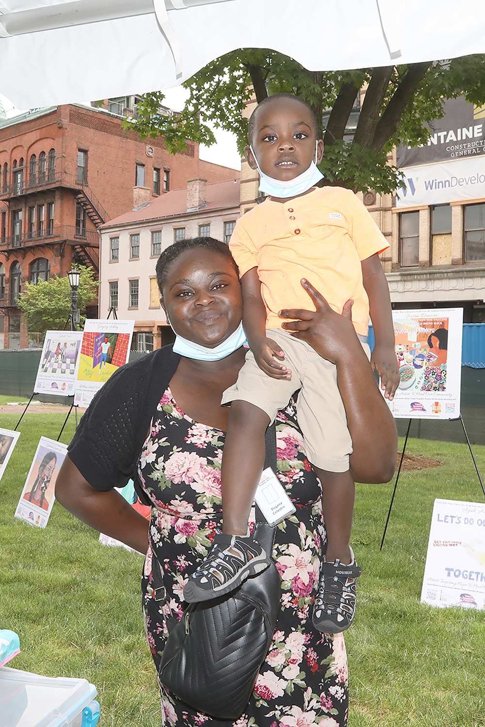 Dugana Celestin with her son Eliot at Chalk for Change 2022 taking place at Court Square in Springfield on July 16th. (Ed Cohen Photo)