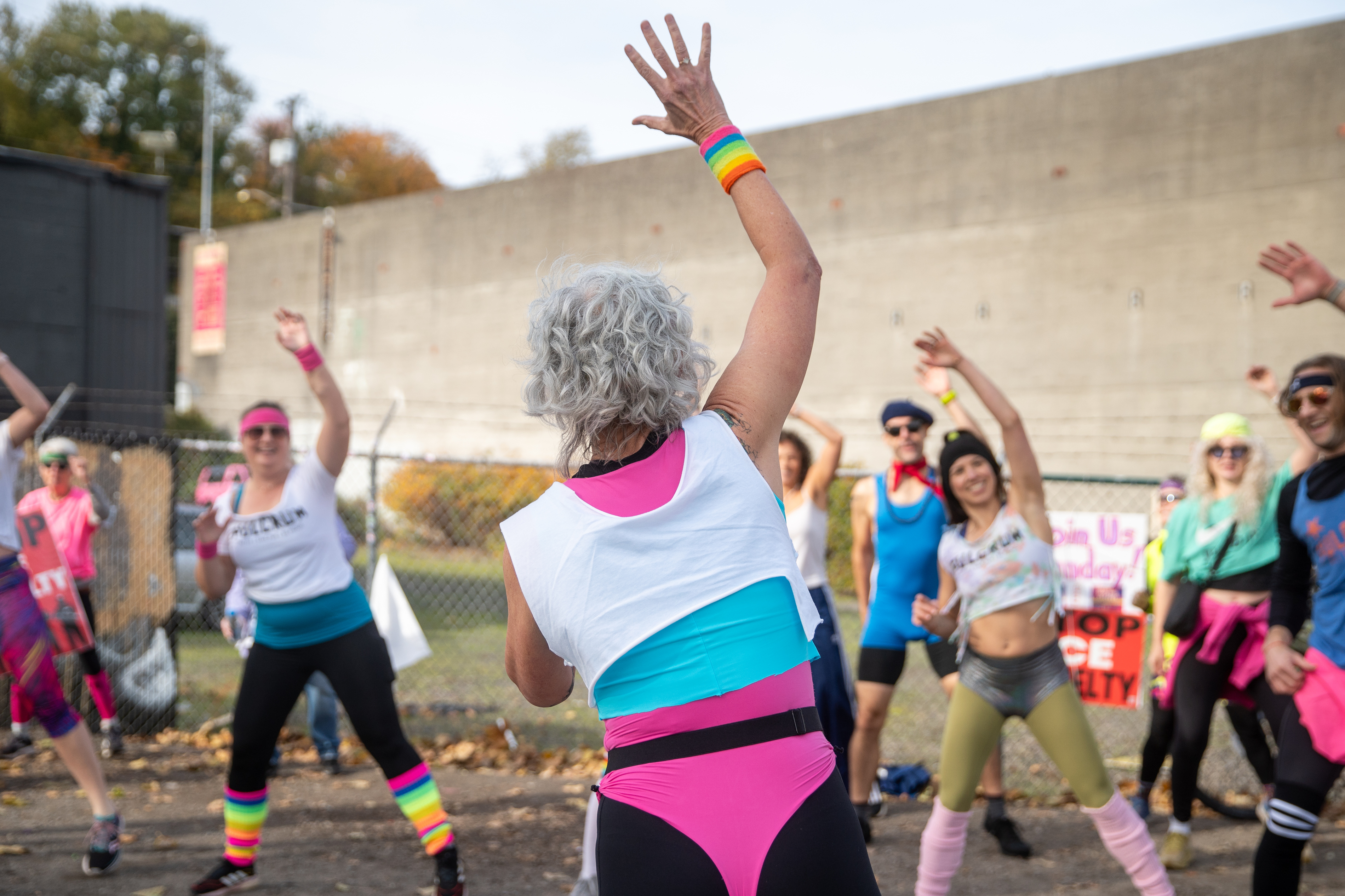 Participants in Fulcrum Fitness’s “Sweatin’ Out the Fascists” held an ’80s-aerobics peaceful protest outside the U.S. Immigration and Customs Enforcement (ICE) facility in South Portland on Sunday, Nov. 9, 2025, collecting donations for the Oregon Food Bank.
