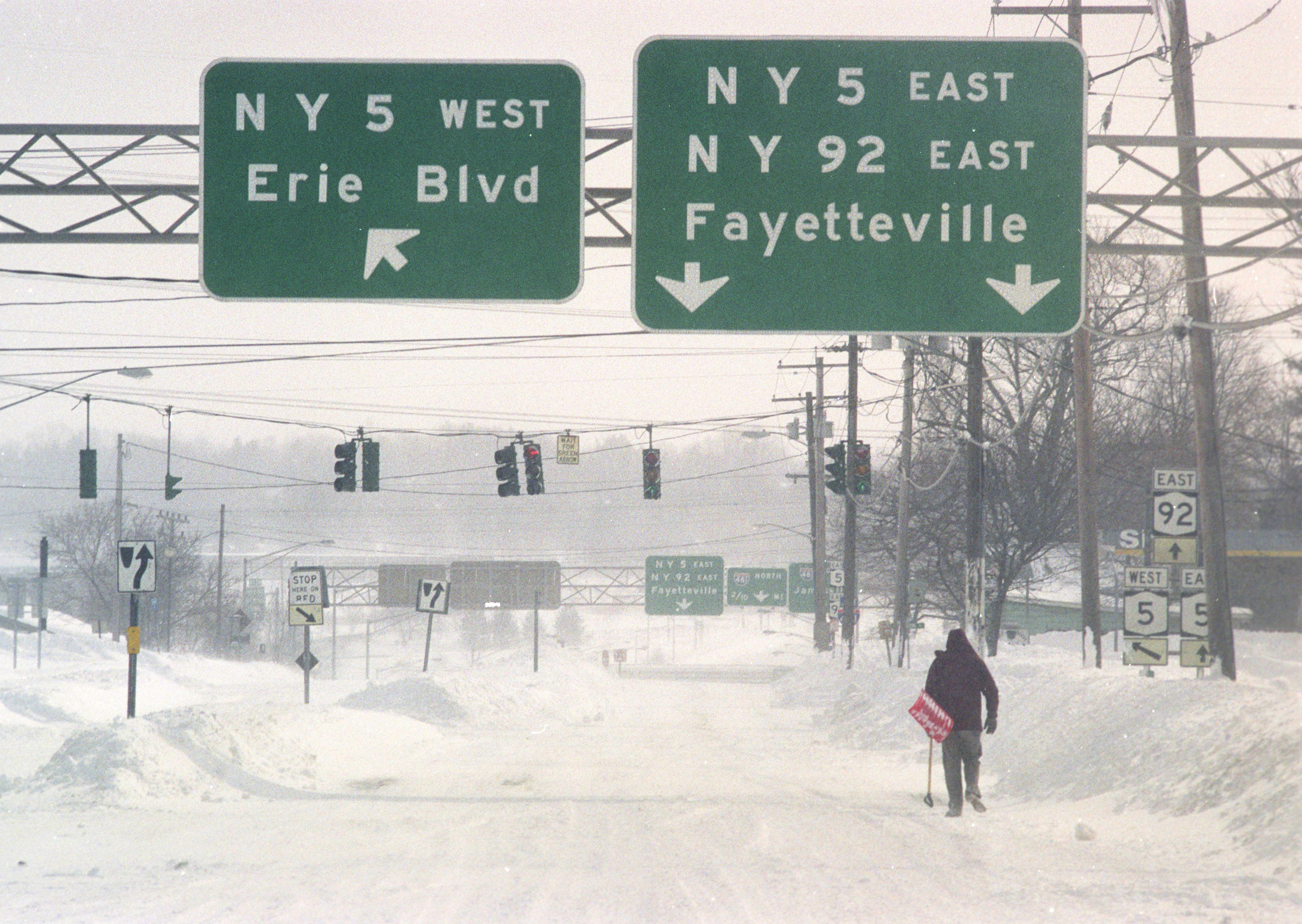 The view along East Genesee St. in Dewitt the day after the Blizzard of 1993 hit the area and dumped some 40 inches of snow on the area. Nicholas Lisi / The Post-Standard