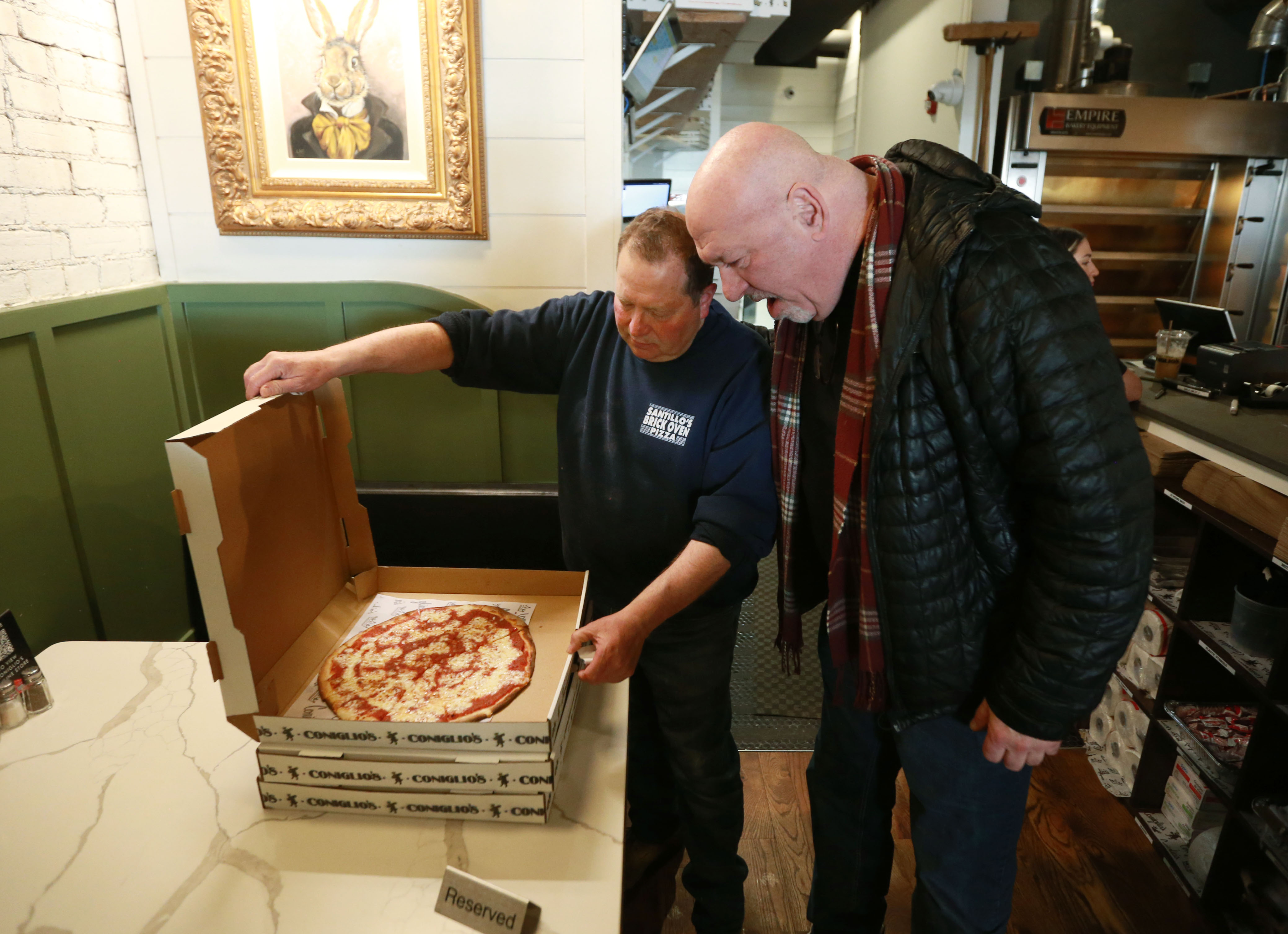 Pizza maker Al Santillo is making pizza at Coniglio’s as his place is ...