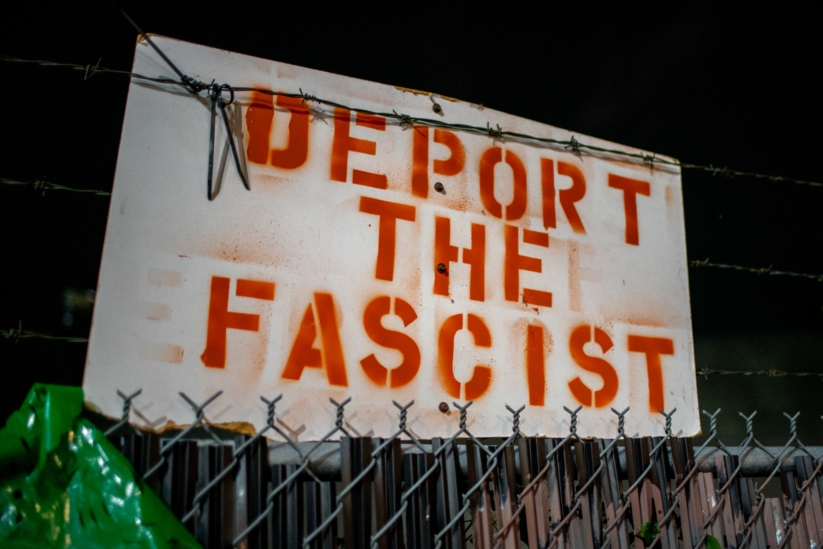 Protesters gather outside the boarded-up U.S. Immigration and Customs Enforcement building in South Portland on Monday, Sept. 8, 2025, days after President Donald Trump suggested federal intervention.