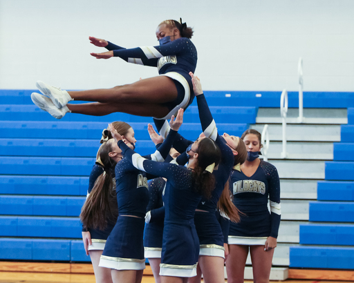 West Genesee High School cheerleaders perform during the Cheerleading Section III Championship at Sandy Creek Central School District Saturday, November 6, 2021. Marilu Lopez Fretts | Contributing Photographer Marilu Lopez Fretts