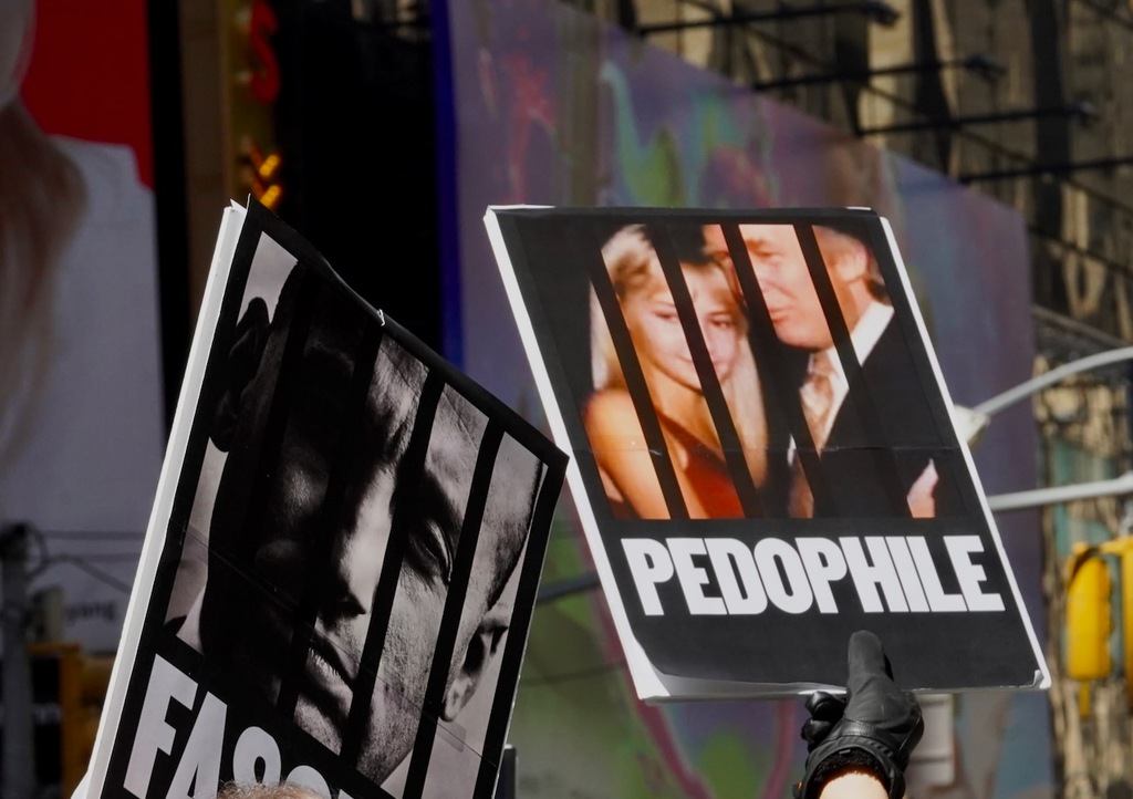 Photos: Tens of thousands march through Times Square in ‘No Kings ...