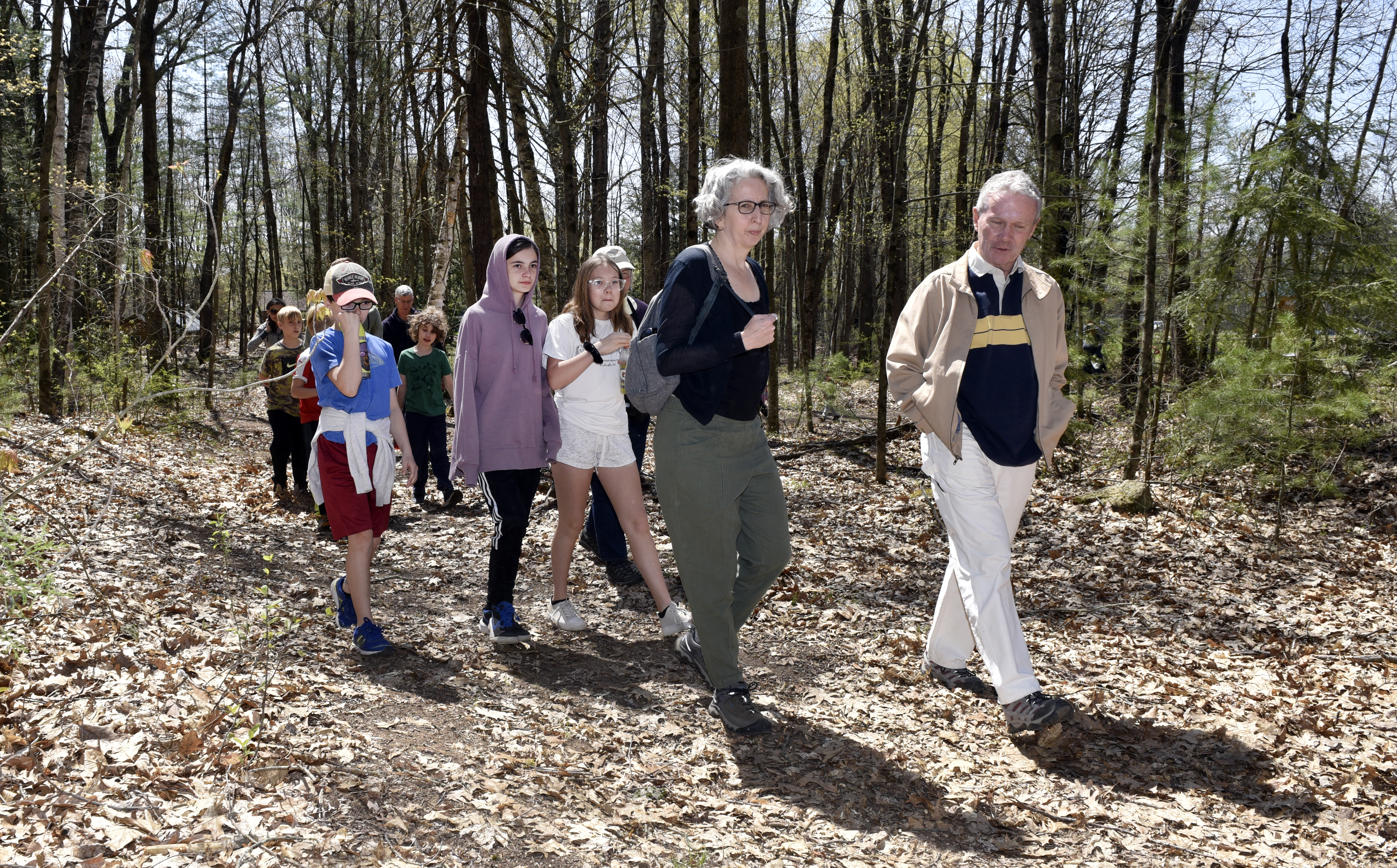Hikers walk along the recently renovated Gloutak Woods Trail in Holyoke.   (Don Treeger / The Republican)  4/21/2023