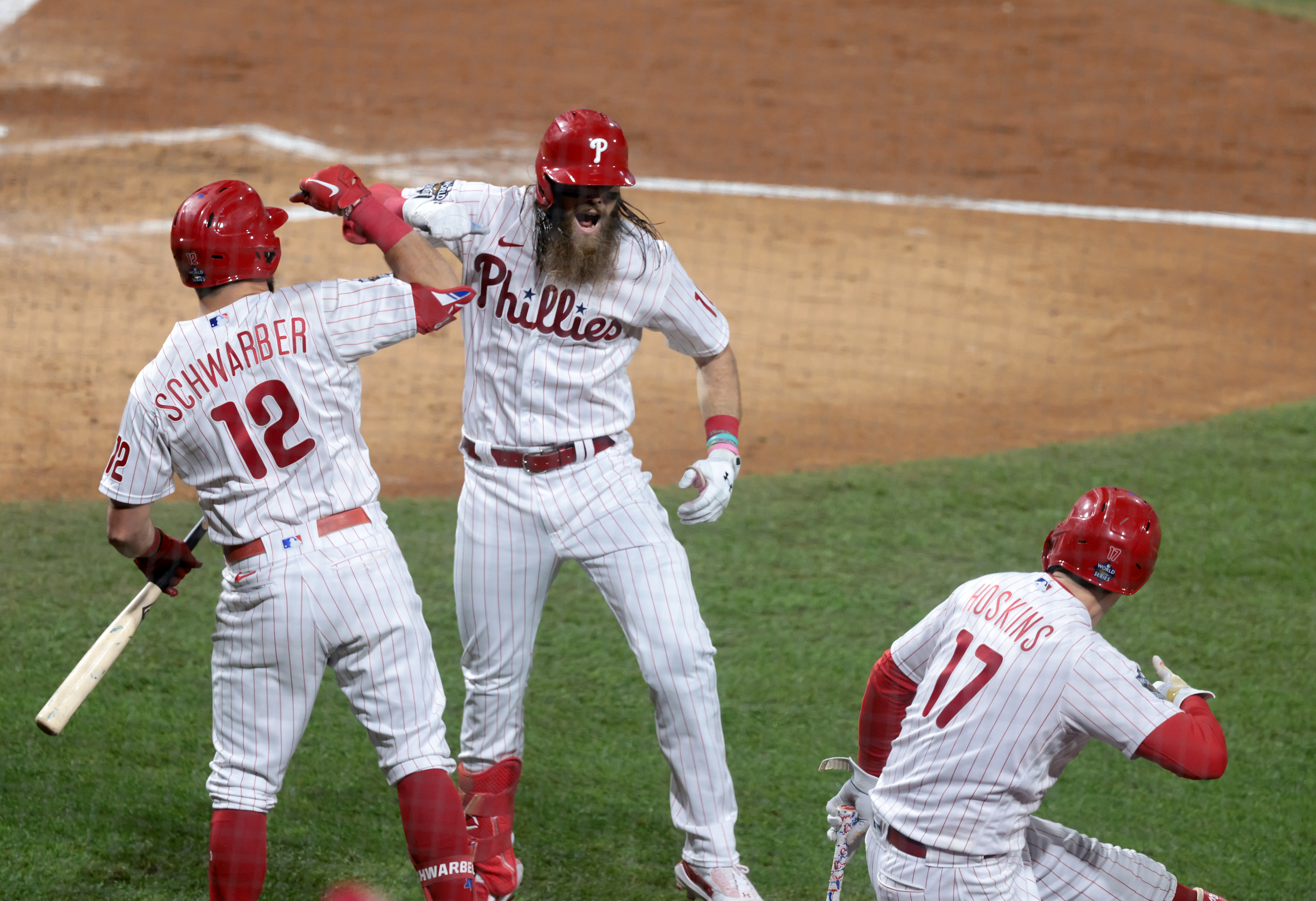 Brandon Marsh (16) of the Philadelphia Phillies is congratulated by Kyle Schwarber (12) after hitting a home run vs. the Houston Astros in the second inning during Game 3 of the World Series at Citizens Bank Park, Tuesday, Nov. 1 2022.