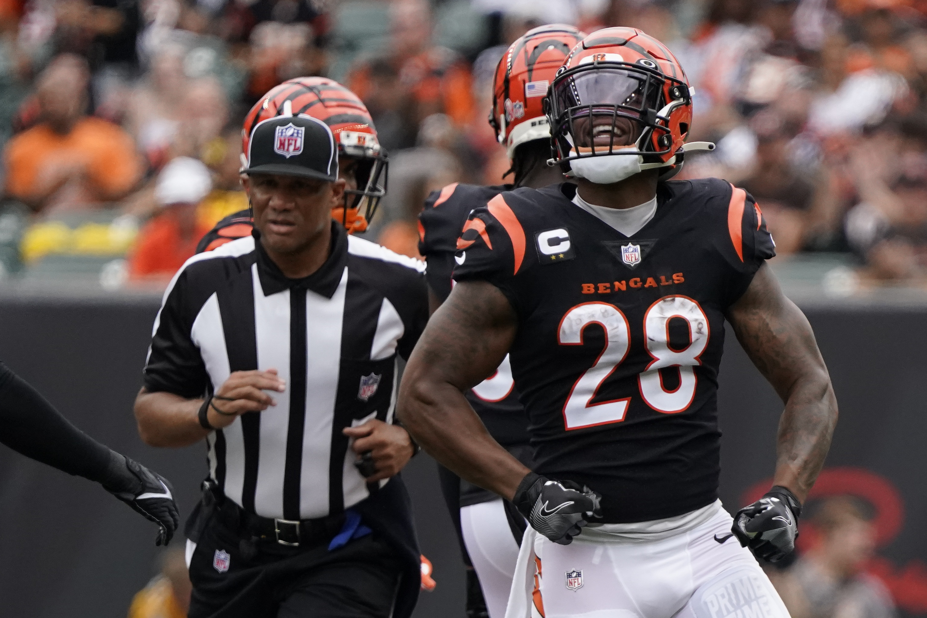 East Rutherford, New Jersey, USA: November 3, 2021, Cincinnati Bengals  running back Joe Mixon (28) gets flipped after making a long run during a  NFL football game against the New York Jets