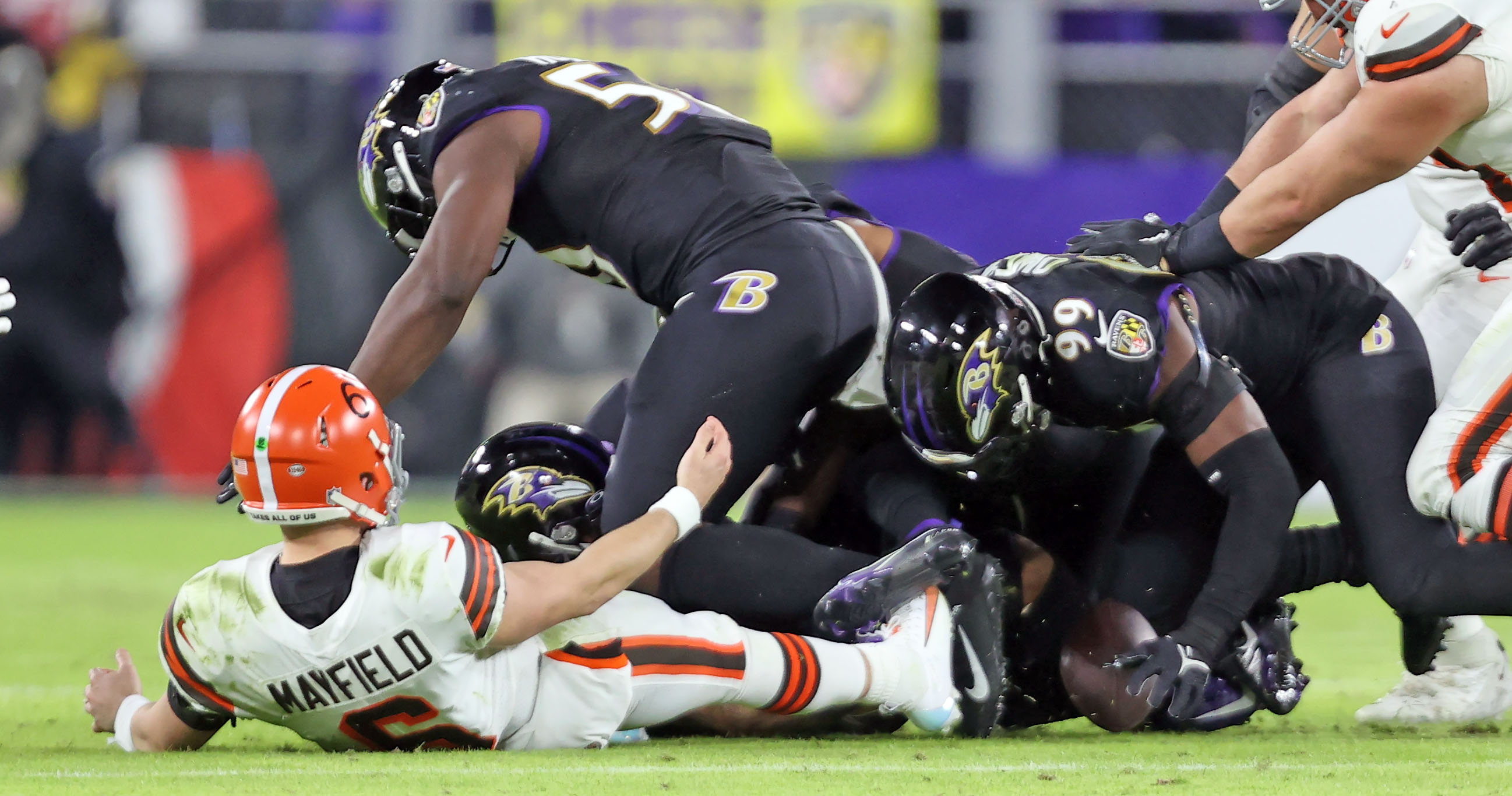 Baltimore Ravens linebacker Odafe Oweh (99) walks off the field