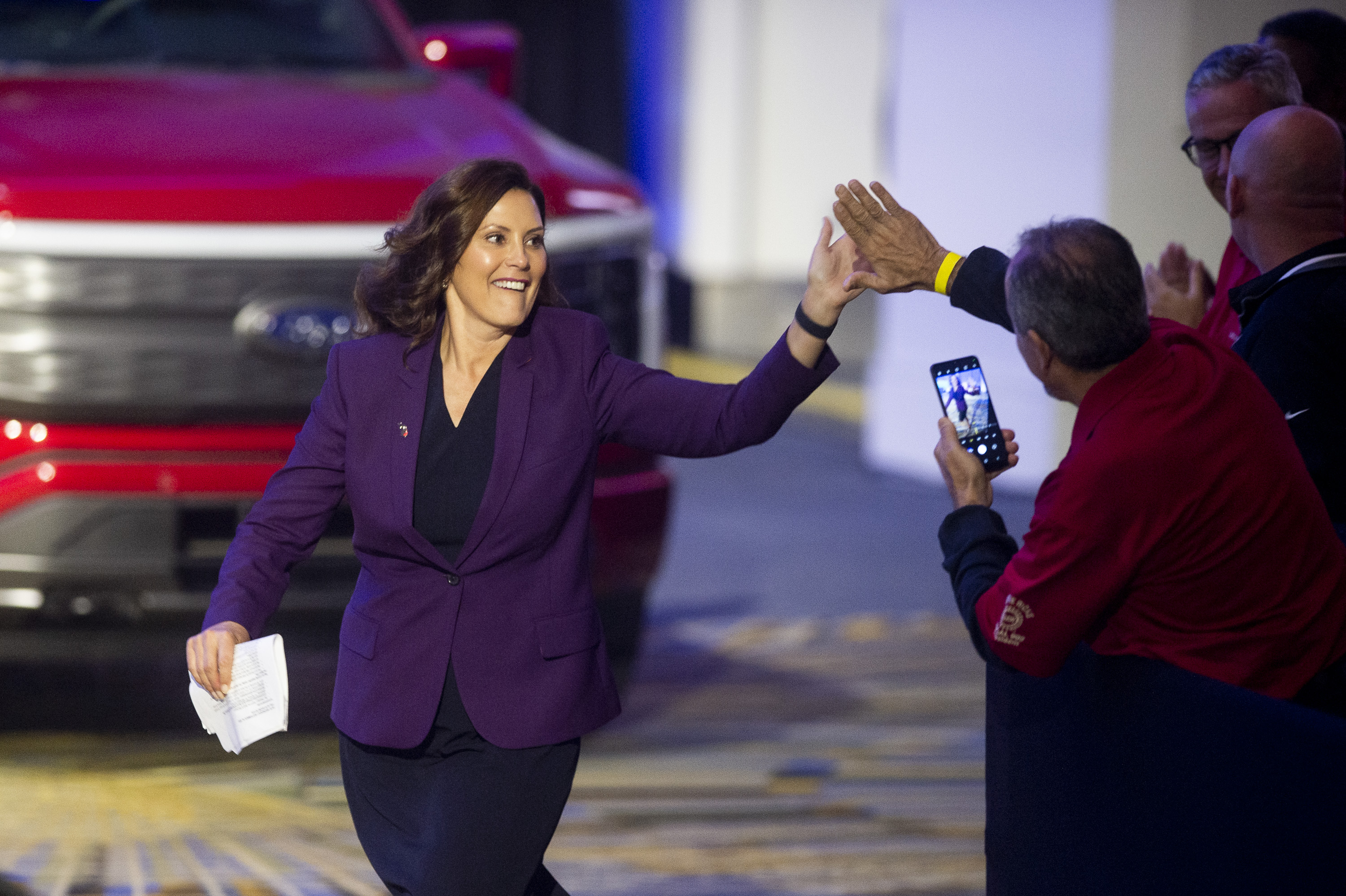 Michigan Gov. Gretchen Whitmer greets supporters during the 2022 North American International Auto Show at Huntington Place in Detroit on Wednesday, Sept. 14 2022.
