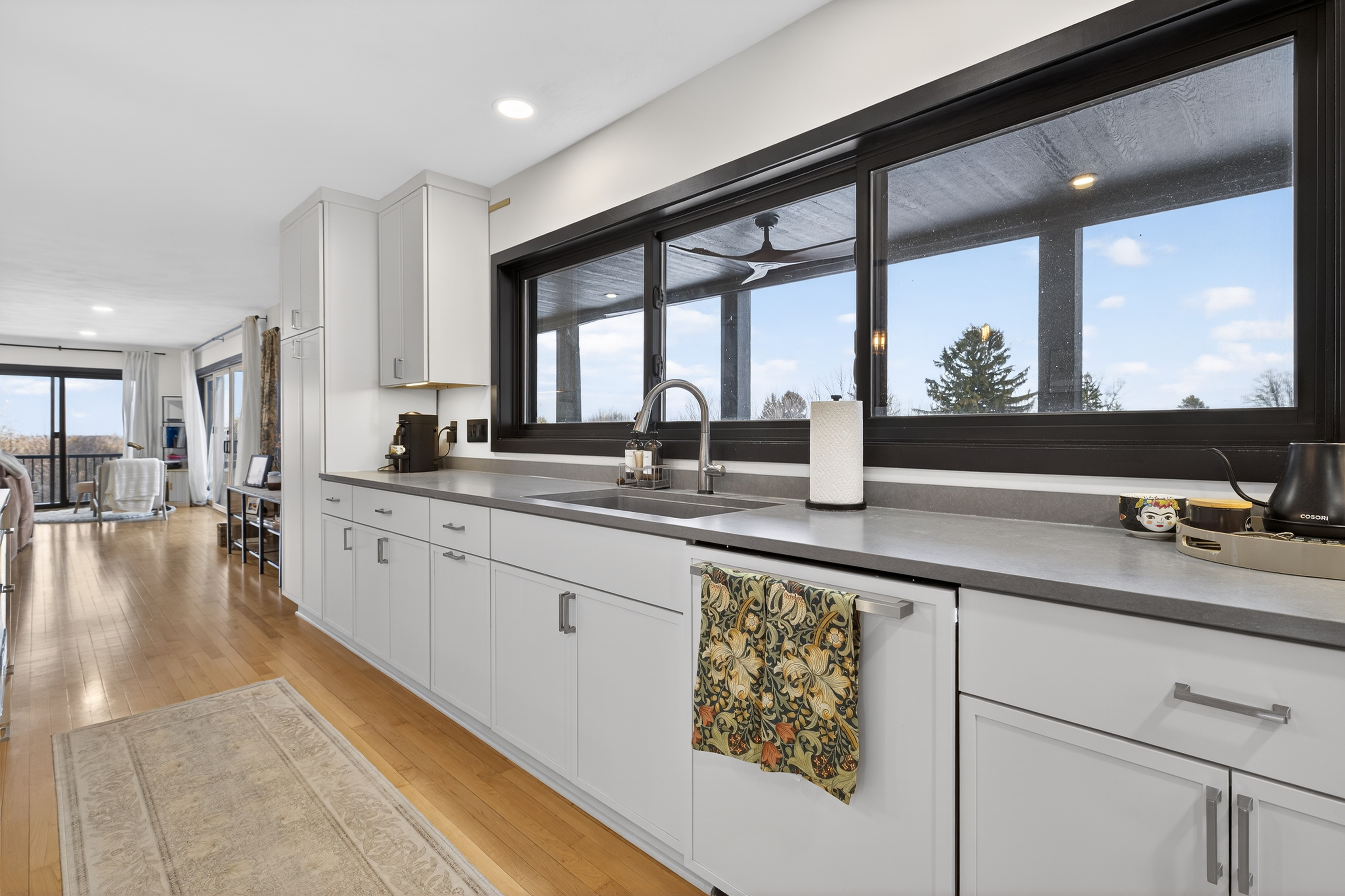 - Christina Cianciosi grew up admiring the house at 101 Alton Street in Syracuse which borders Bellevue Country Club. In 2022, she bought the unique home and gave it an extensive renovation. The kitchen features a long window and counter and storage space. Courtesy of Kyle Fedrizzi, owner of kfotography315, LLC.