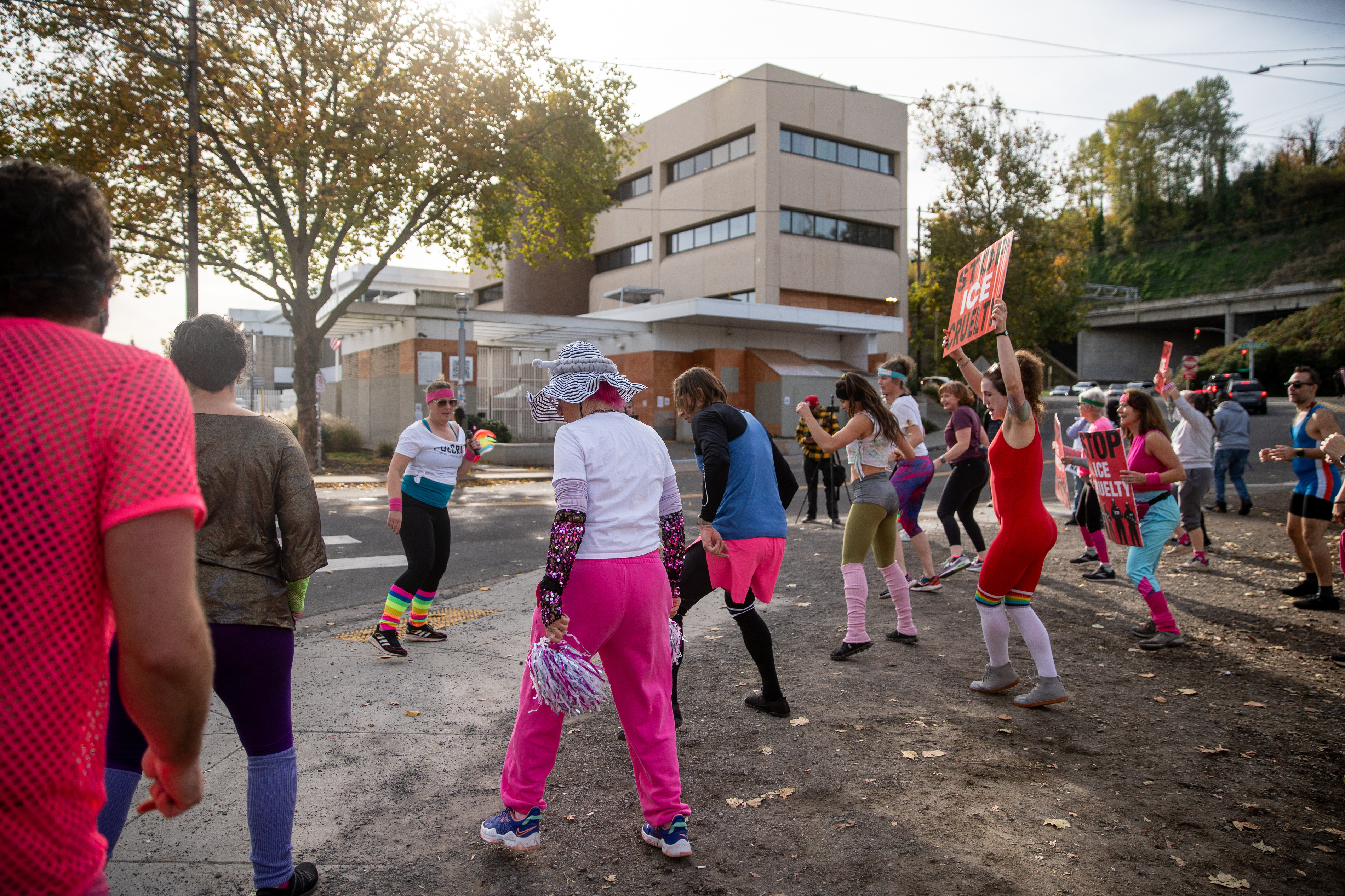 Participants in Fulcrum Fitness’s “Sweatin’ Out the Fascists” held an ’80s-aerobics peaceful protest outside the U.S. Immigration and Customs Enforcement (ICE) facility in South Portland on Sunday, Nov. 9, 2025, collecting donations for the Oregon Food Bank.