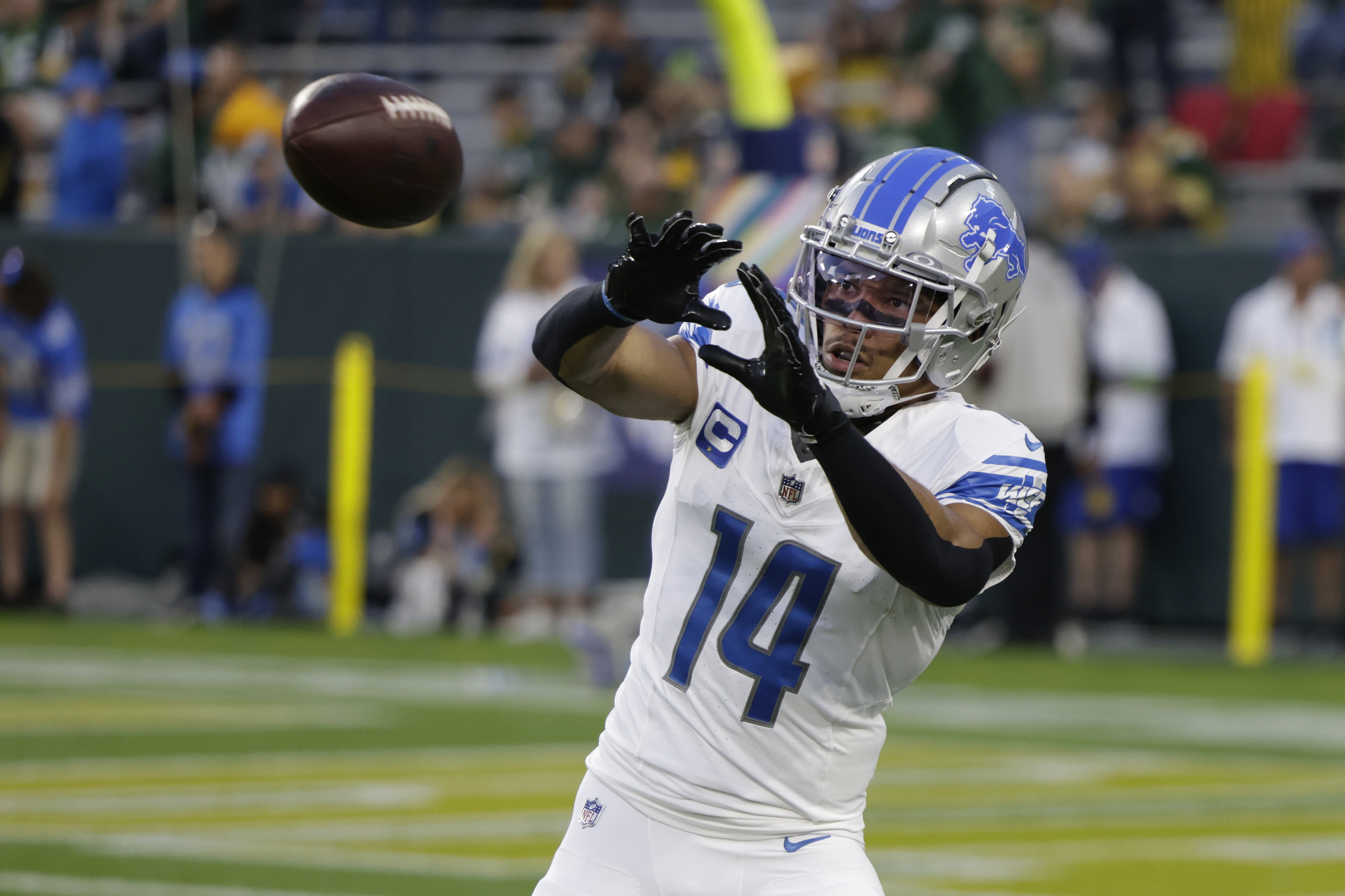 Detroit's St. Brown gets Lambeau Leap beer shower in Lions fans-filled  stadium