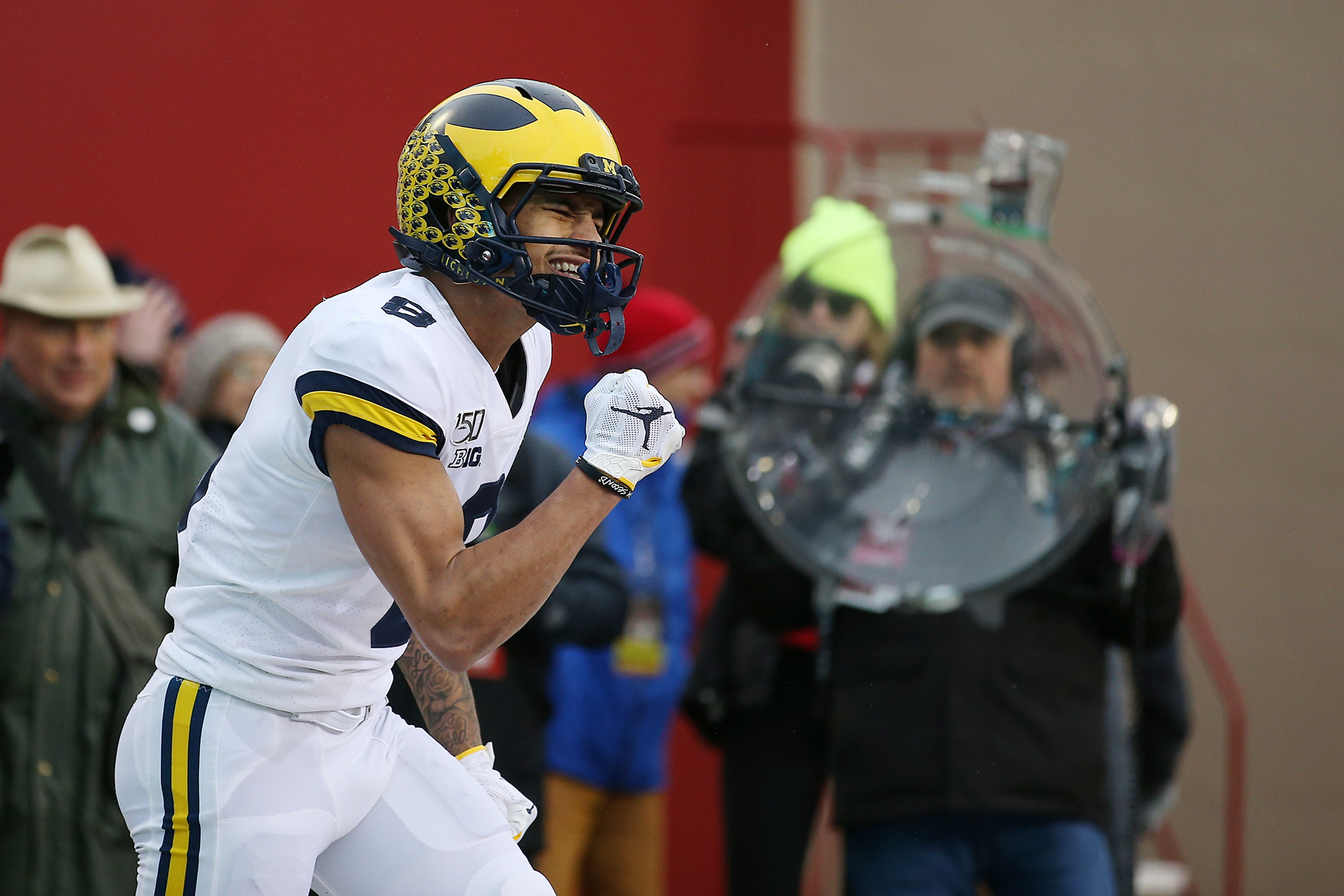 Michigan’s Ronnie Bell moves to the front of the line