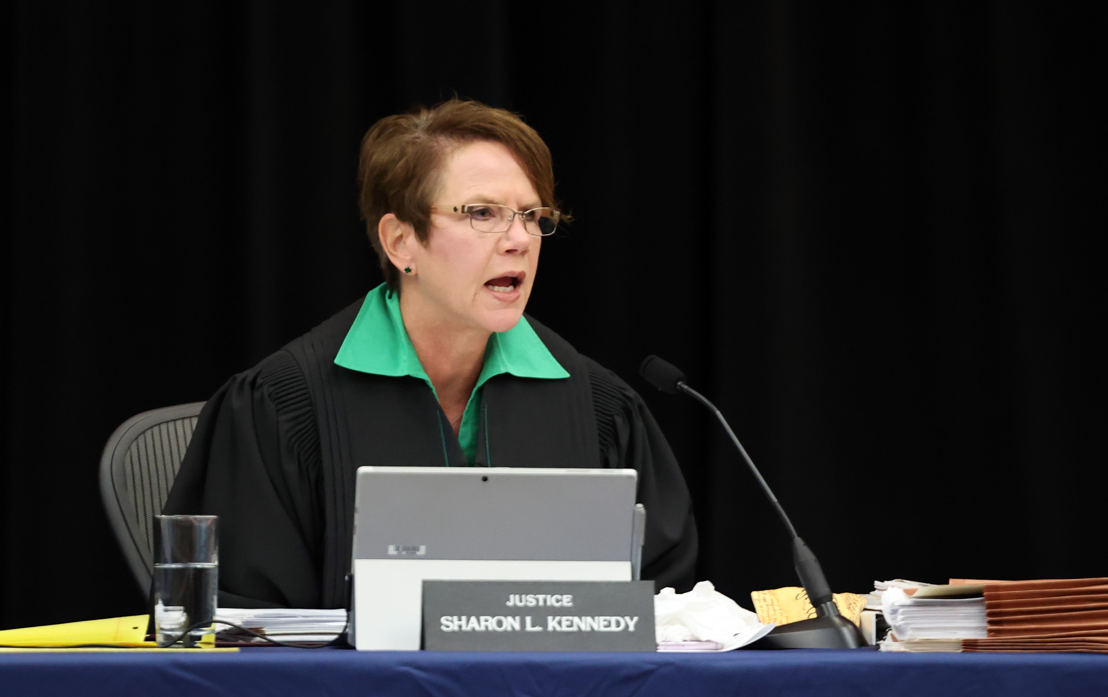 Ohio Supreme Court Chief Justice Sharon Kennedy wears robe of mentor Crehan  while being sworn-in