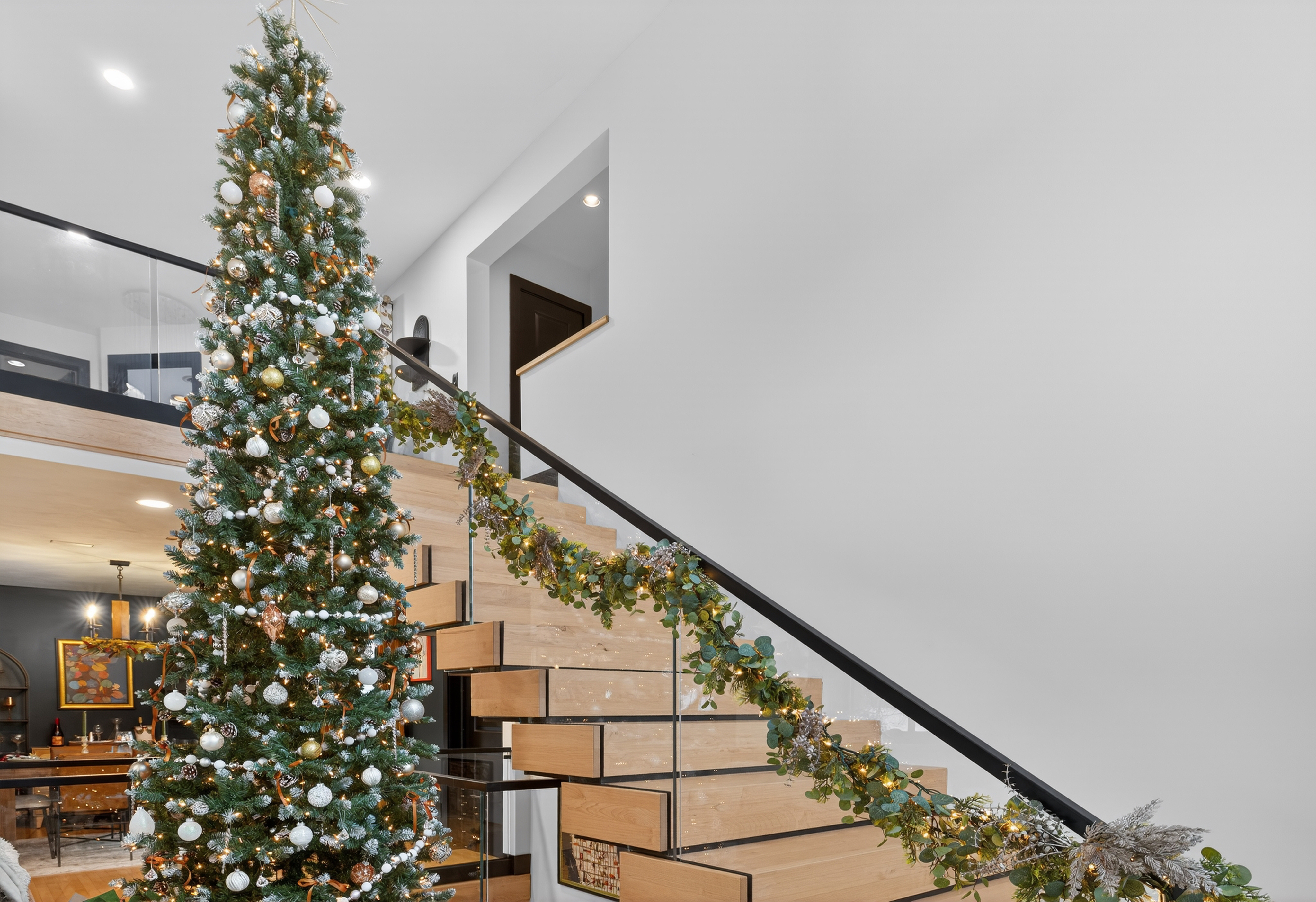 - Christina Cianciosi grew up admiring the house at 101 Alton Street in Syracuse which borders Bellevue Country Club. In 2022, she bought the unique home and gave it an extensive renovation. The new floating staircase features extra wide and long steps. Courtesy of Kyle Fedrizzi, owner of kfotography315, LLC.