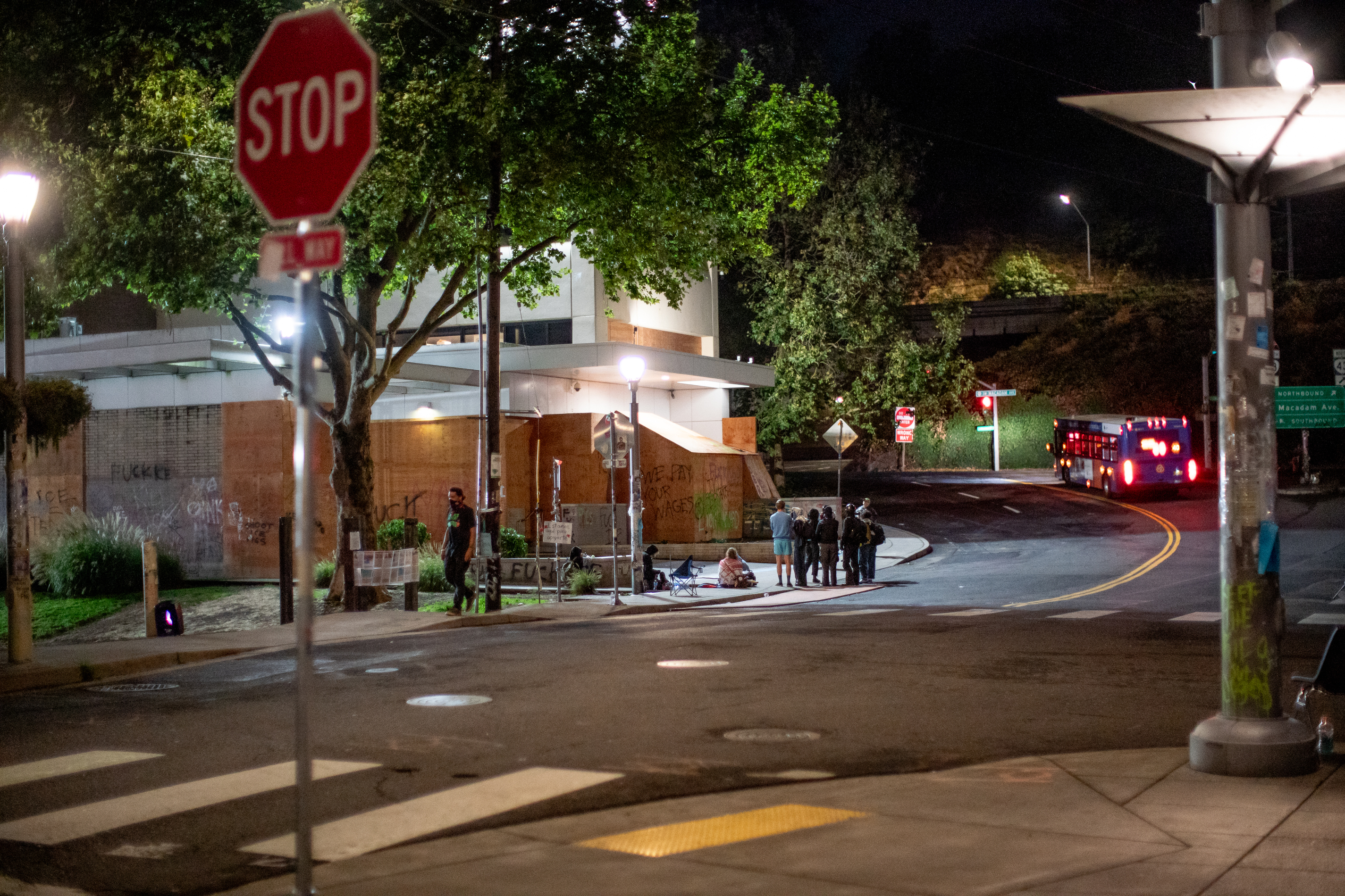 Protesters gather outside the boarded-up U.S. Immigration and Customs Enforcement building in South Portland on Monday, Sept. 8, 2025, days after President Donald Trump suggested federal intervention.