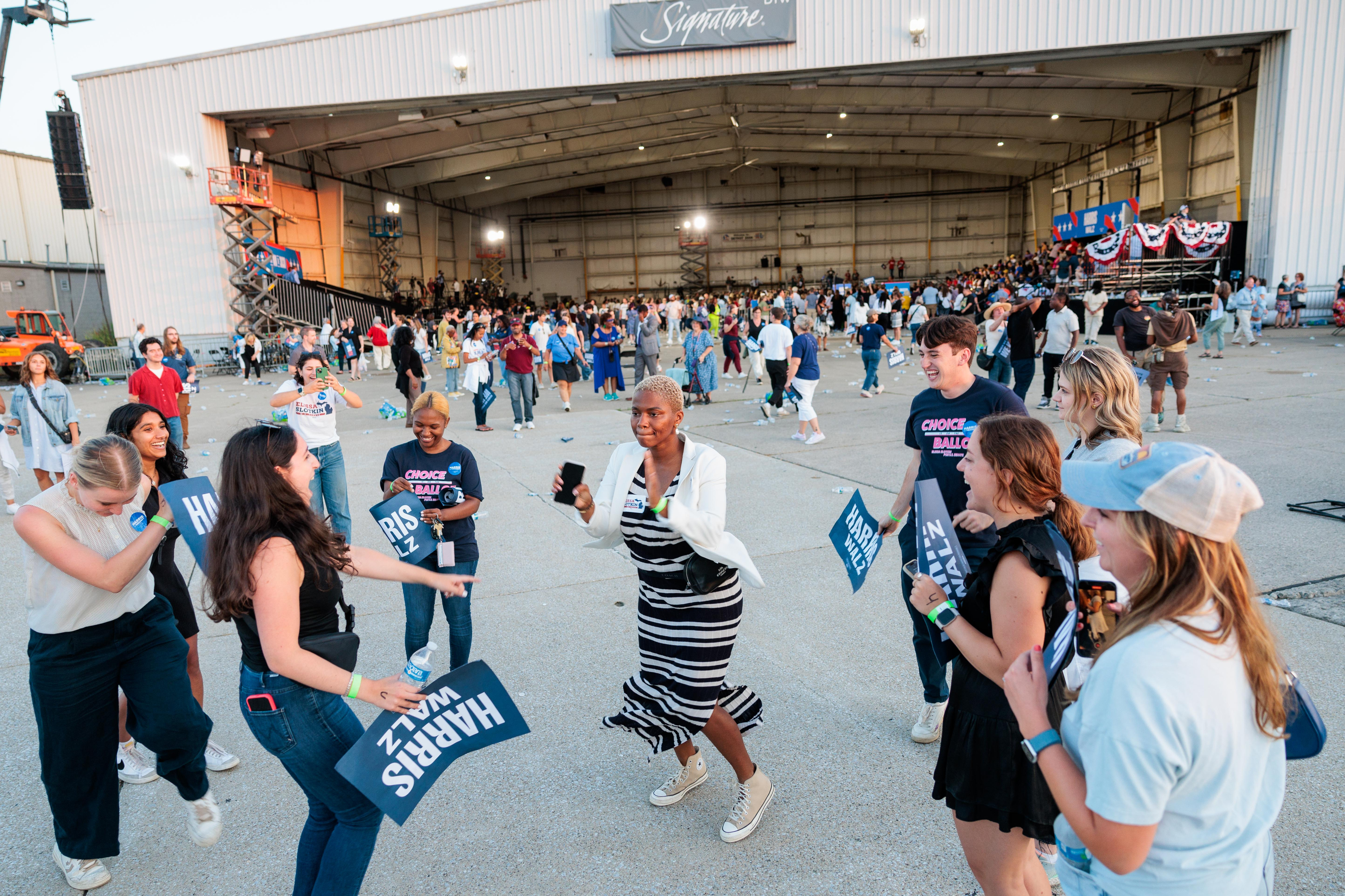Kamala Harris and Tim Walz host rally outside Detroit - mlive.com