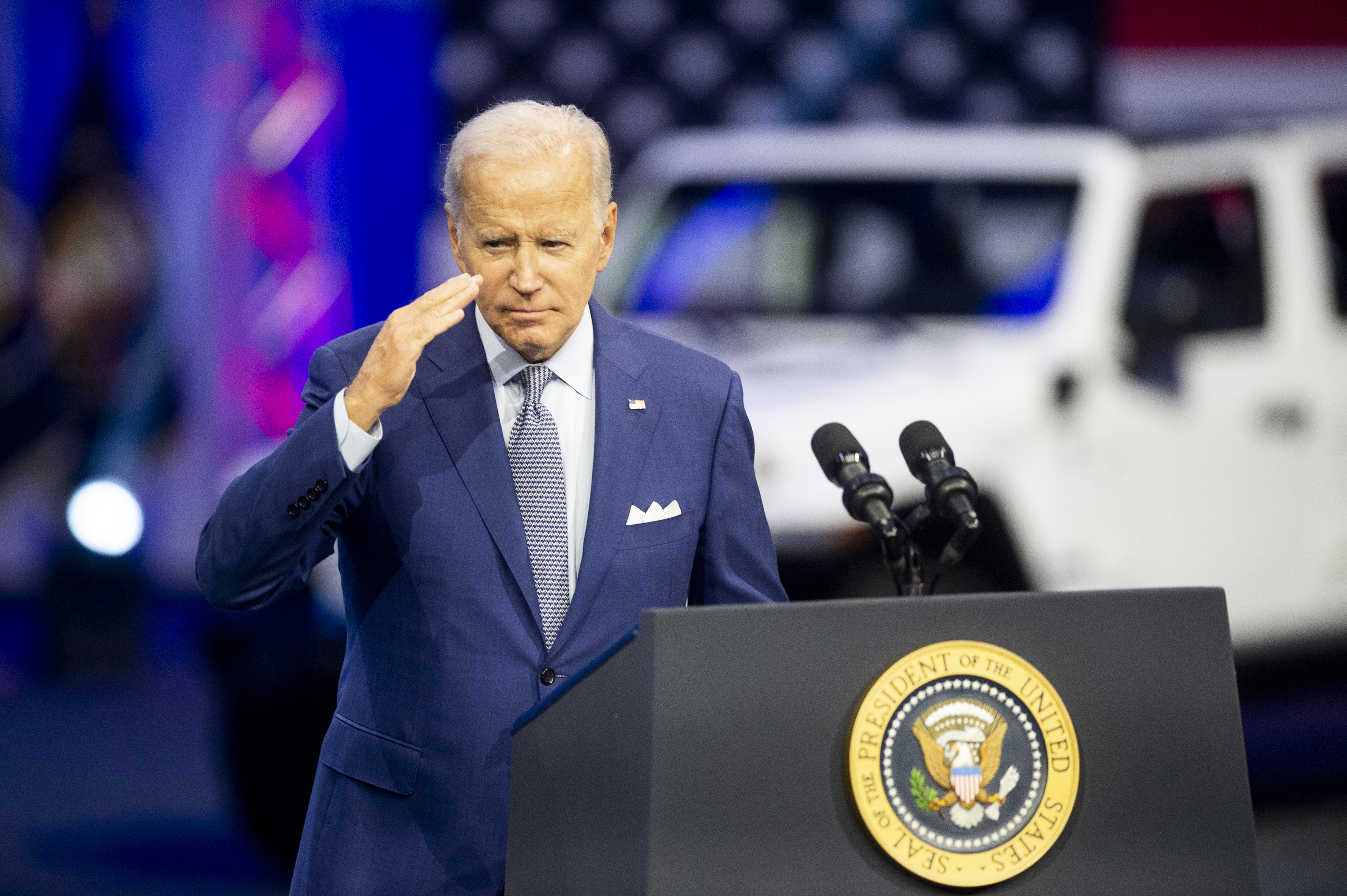 U.S. President Joe Biden salutes after speaking during the 2022 North American International Auto Show at Huntington Place in Detroit on Wednesday, Sept. 14 2022.