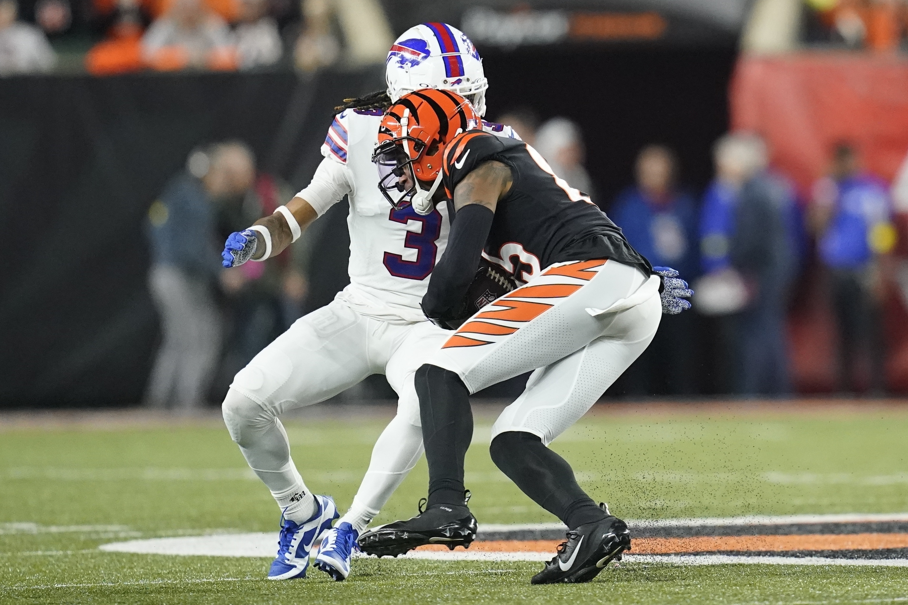 Bengals' Tee Higgins got word that Bills' Damar Hamlin is awake. Here's how  he reacted 