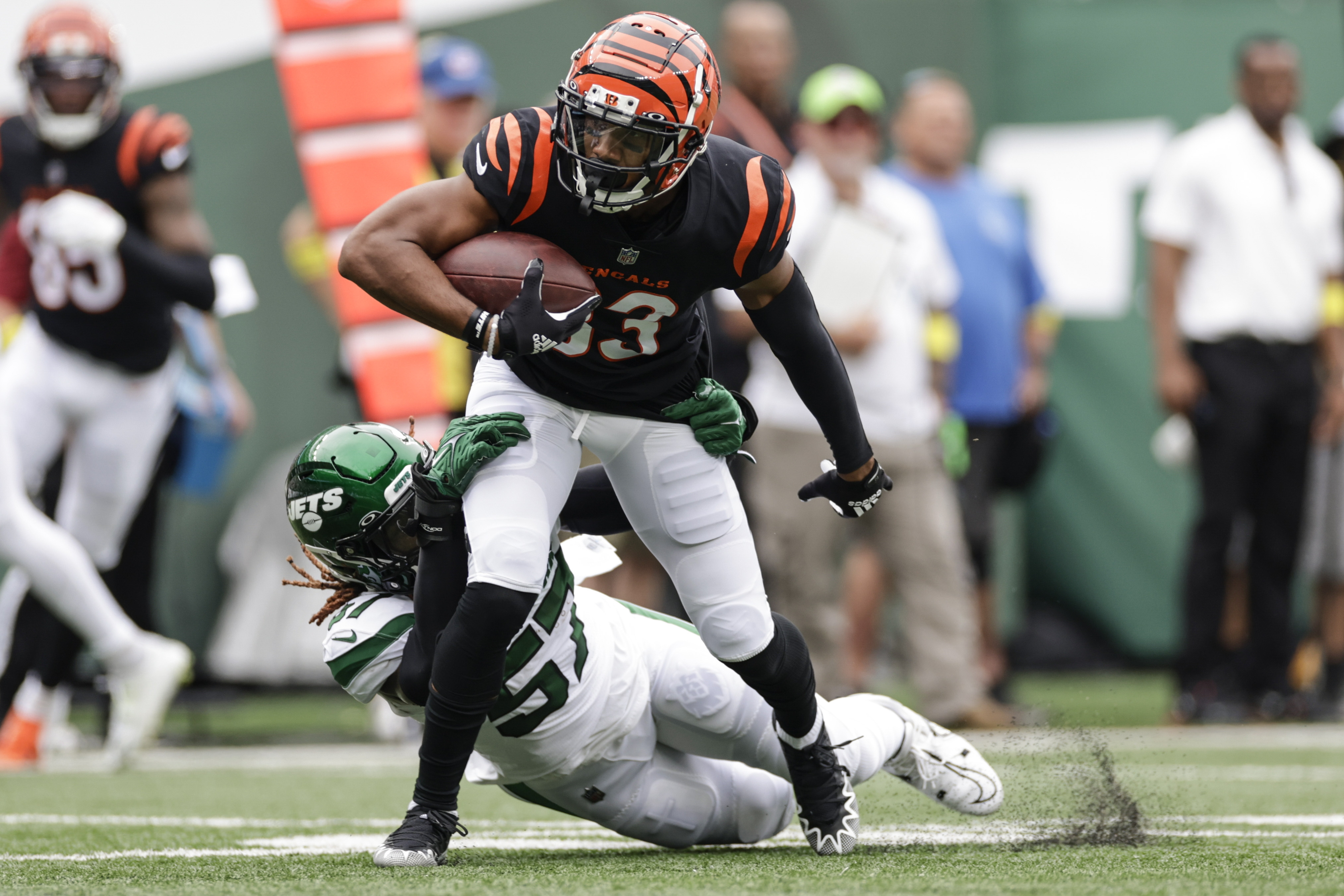 September 25, 2022, East Rutherford, New Jersey, USA: Cincinnati Bengals  linebacker Logan Wilson (55) makes an interception on a pass intended for  New York Jets wide receiver Braxton Berrios (10) during a