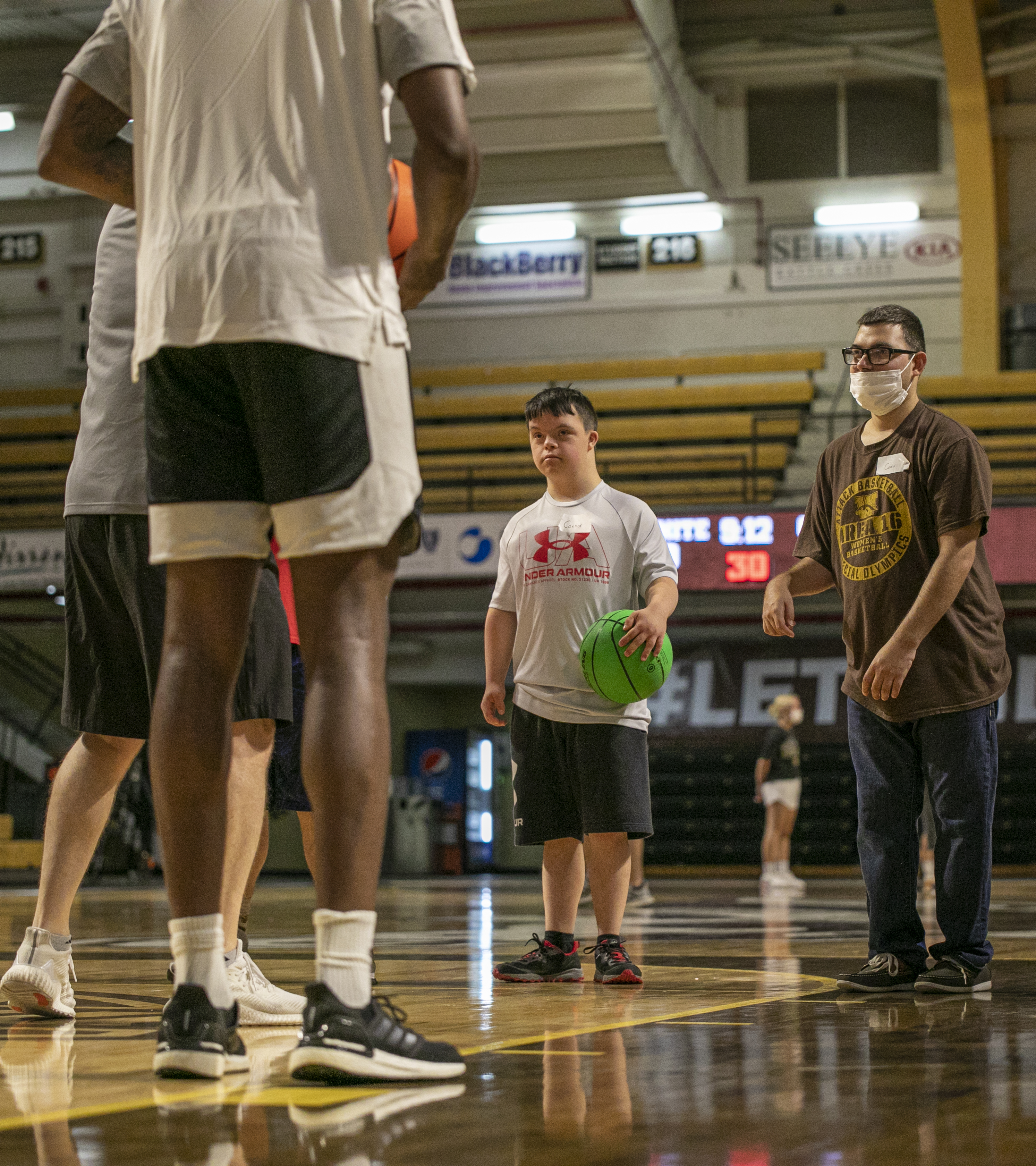The Beautiful Lives Project collaborates with Western Michigan University’s basketball team to give disabled kids and adults a chance to play basketball with members of WMU's men's basketball team and coaching staff at WMU’s University Arena in Kalamazoo, Michigan on Wednesday, June 15, 2022. (Gabi Broekema | MLive.com)