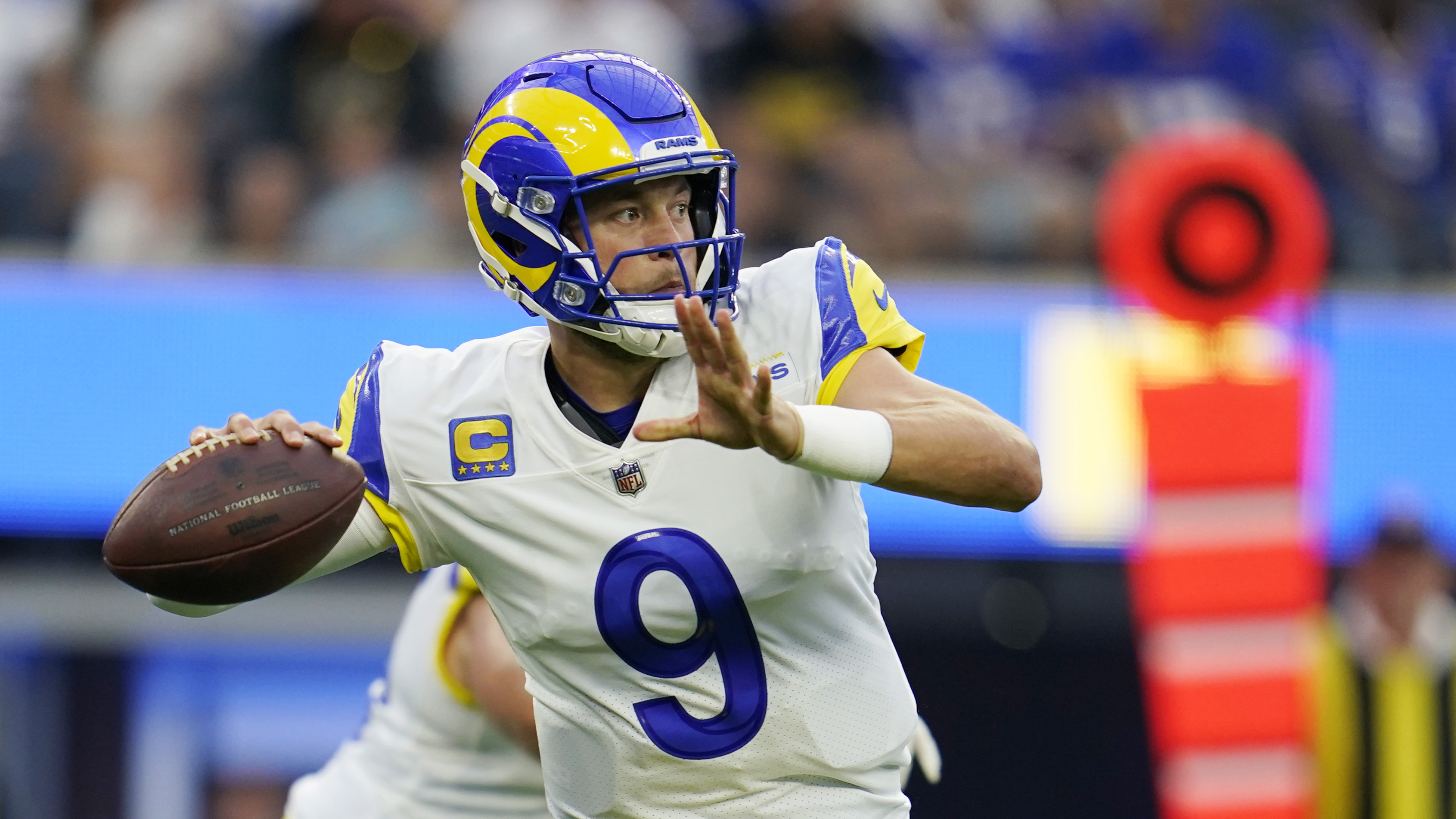 INGLEWOOD, CA - SEPTEMBER 08: Los Angeles Rams quarterback Matthew Stafford  (9) rolls out of the pocket during the NFL game between the Buffalo Bills  and the Los Angeles Rams on September