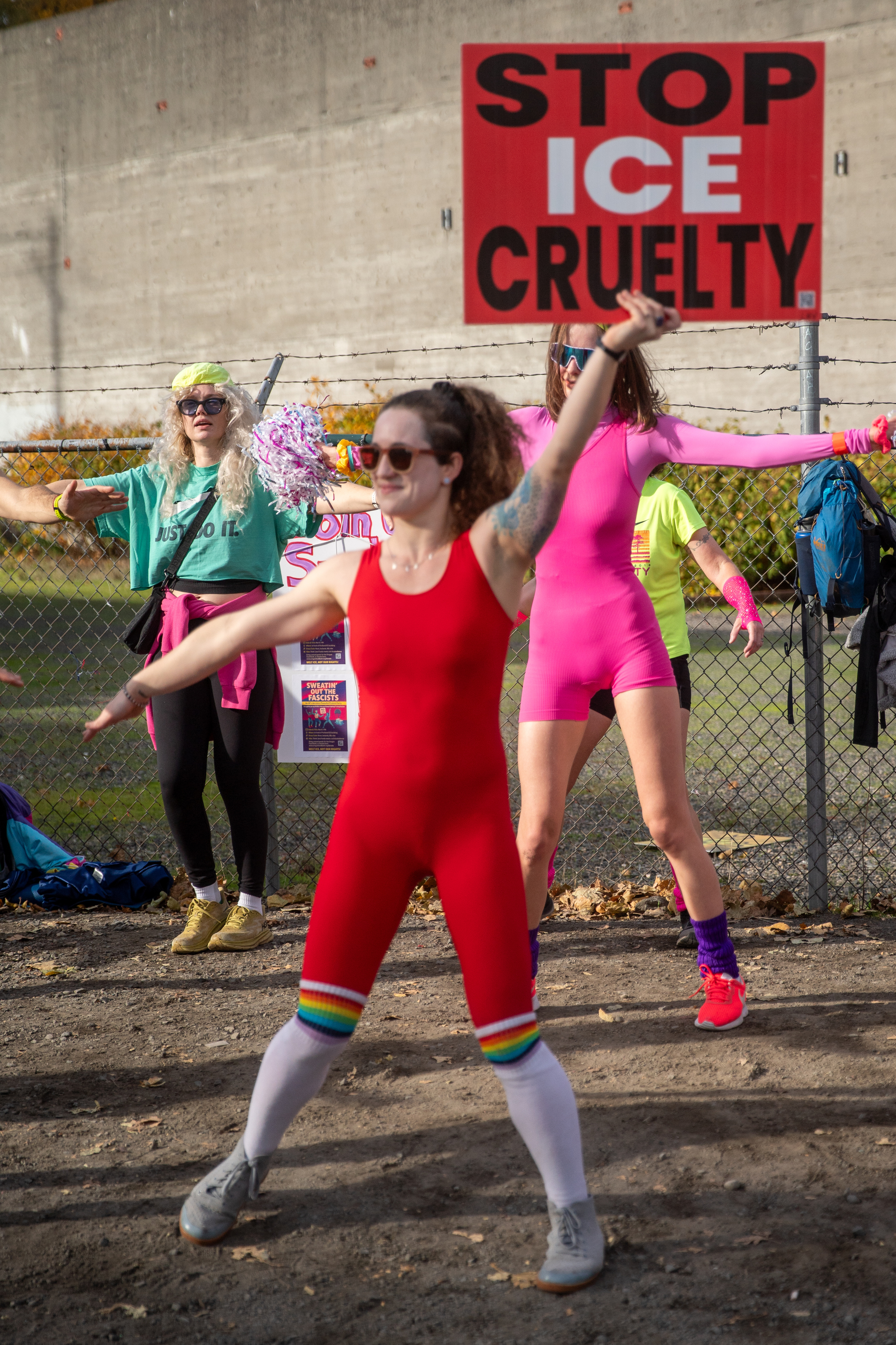 Participants in Fulcrum Fitness’s “Sweatin’ Out the Fascists” held an ’80s-aerobics peaceful protest outside the U.S. Immigration and Customs Enforcement (ICE) facility in South Portland on Sunday, Nov. 9, 2025, collecting donations for the Oregon Food Bank.