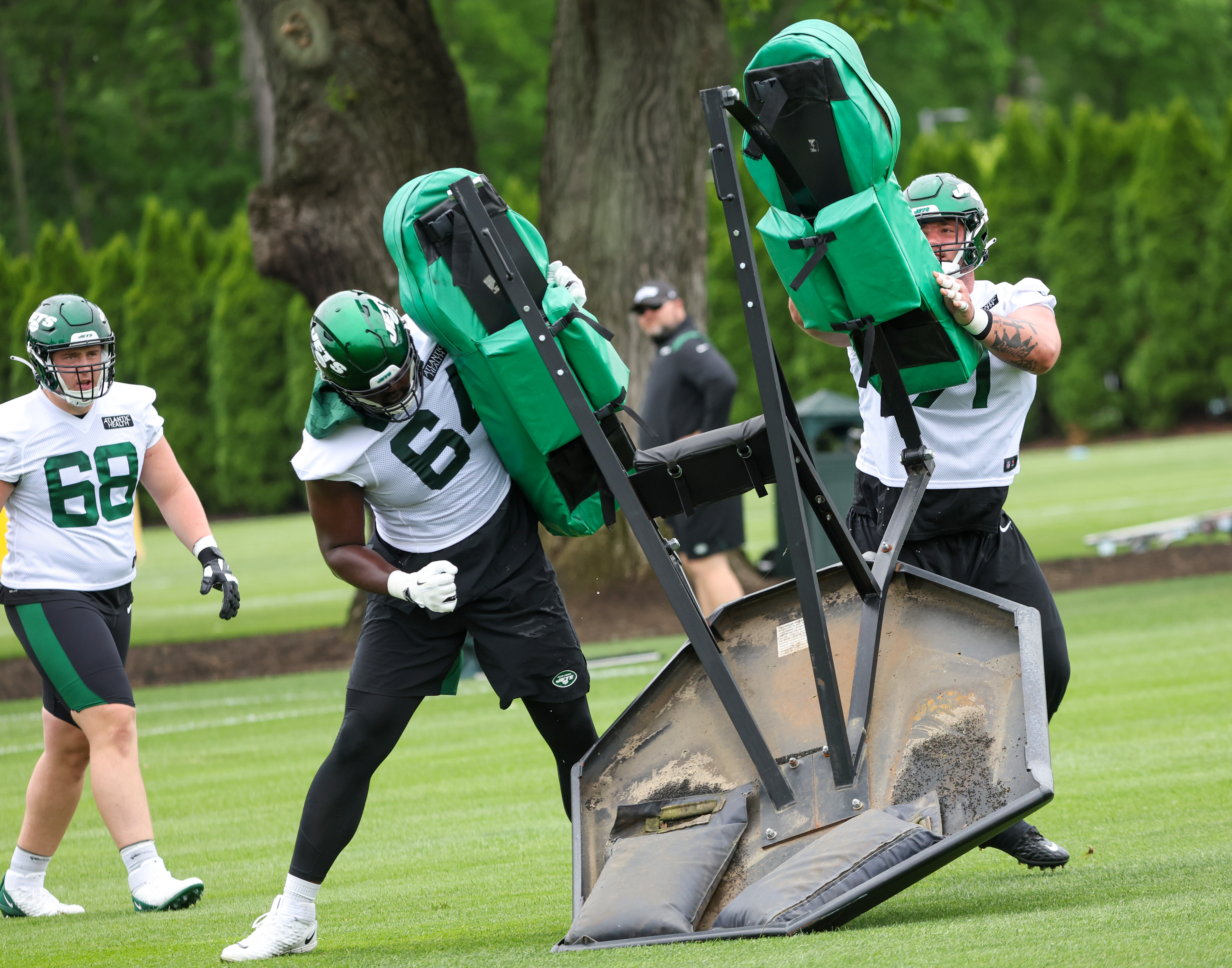 New York Jets guard Nate Herbig (71) walks off the field after an