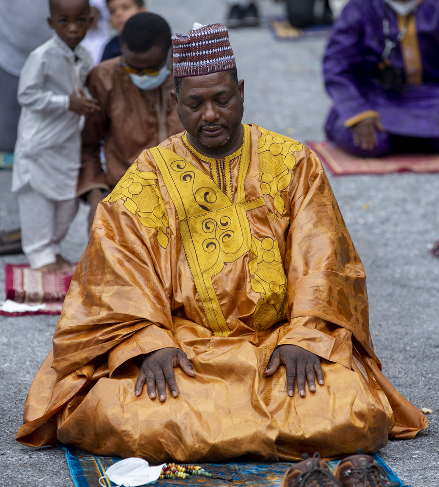 Djibrilla Mangue, of Harrisburg, prays during the Eid Al-Adha holiday at the Islamic Center Masjid Al-Sabereen in Harrisburg, Pa., July 31, 2020. Because of the COVID pandemic members met outdoors, social distancing and had their temperatures taken before attending.
Mark Pynes | mpynes@pennlive.com