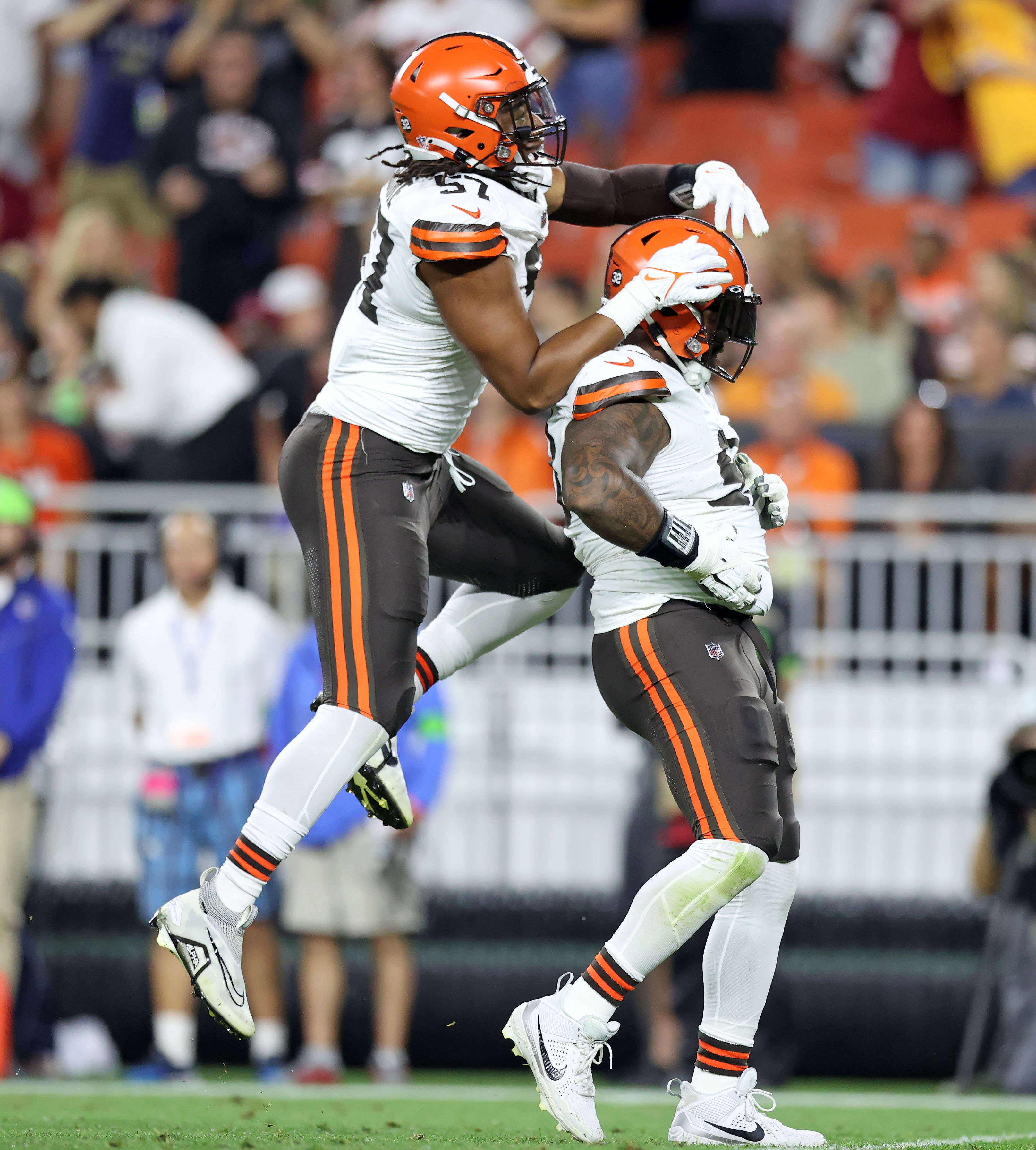 Cleveland Browns defensive end Za'Darius Smith (99) walks off of the field  after an NFL pre-season football game against the Washington Commanders,  Friday, Aug. 11, 2023, in Cleveland. (AP Photo/Kirk Irwin Stock