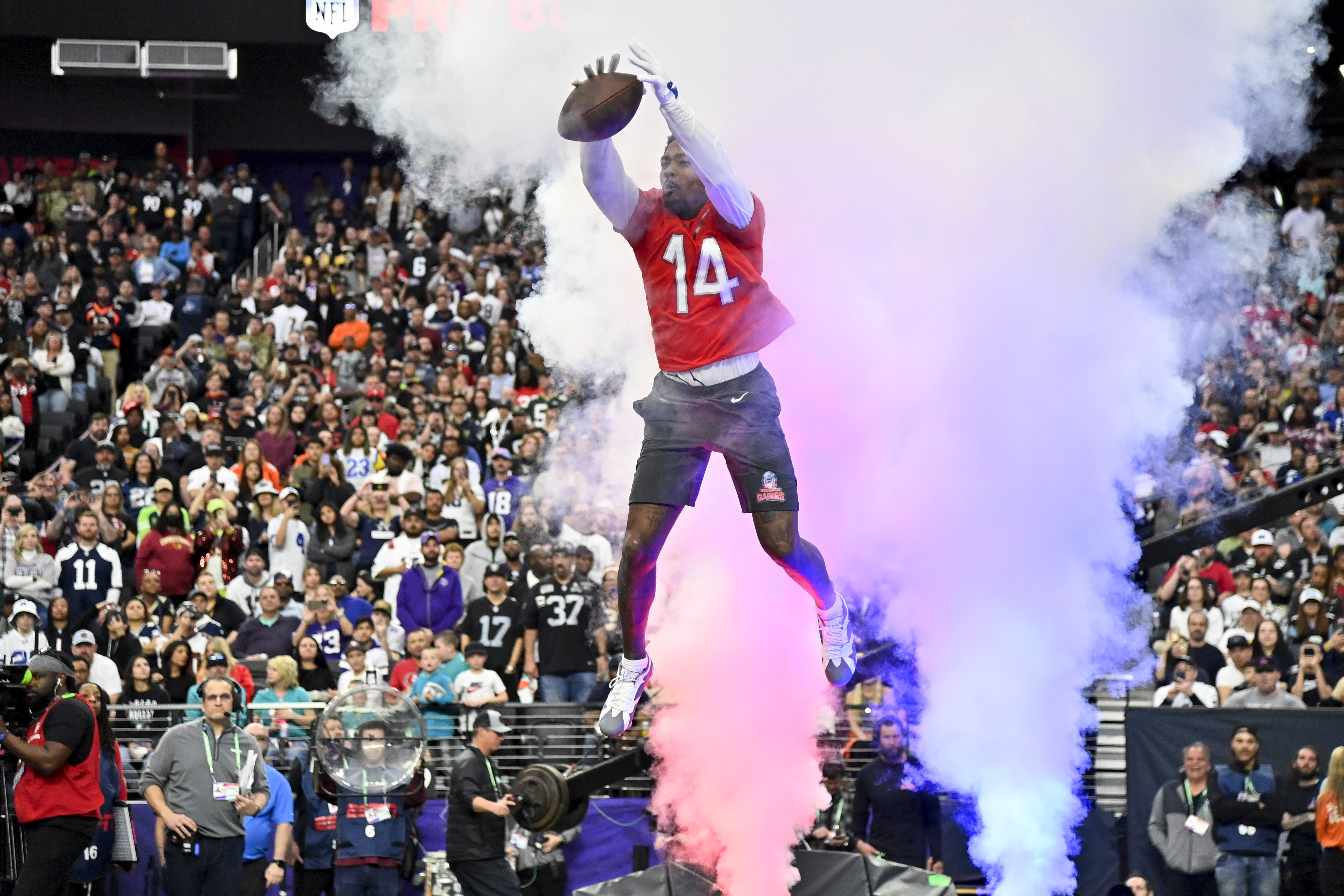 NFC tight end George Kittle (85) of the San Francisco 49ers celebrates a  touchdown with NFC wide receiver Justin Jefferson of the Minnesota Vikings  during the flag football event at the NFL