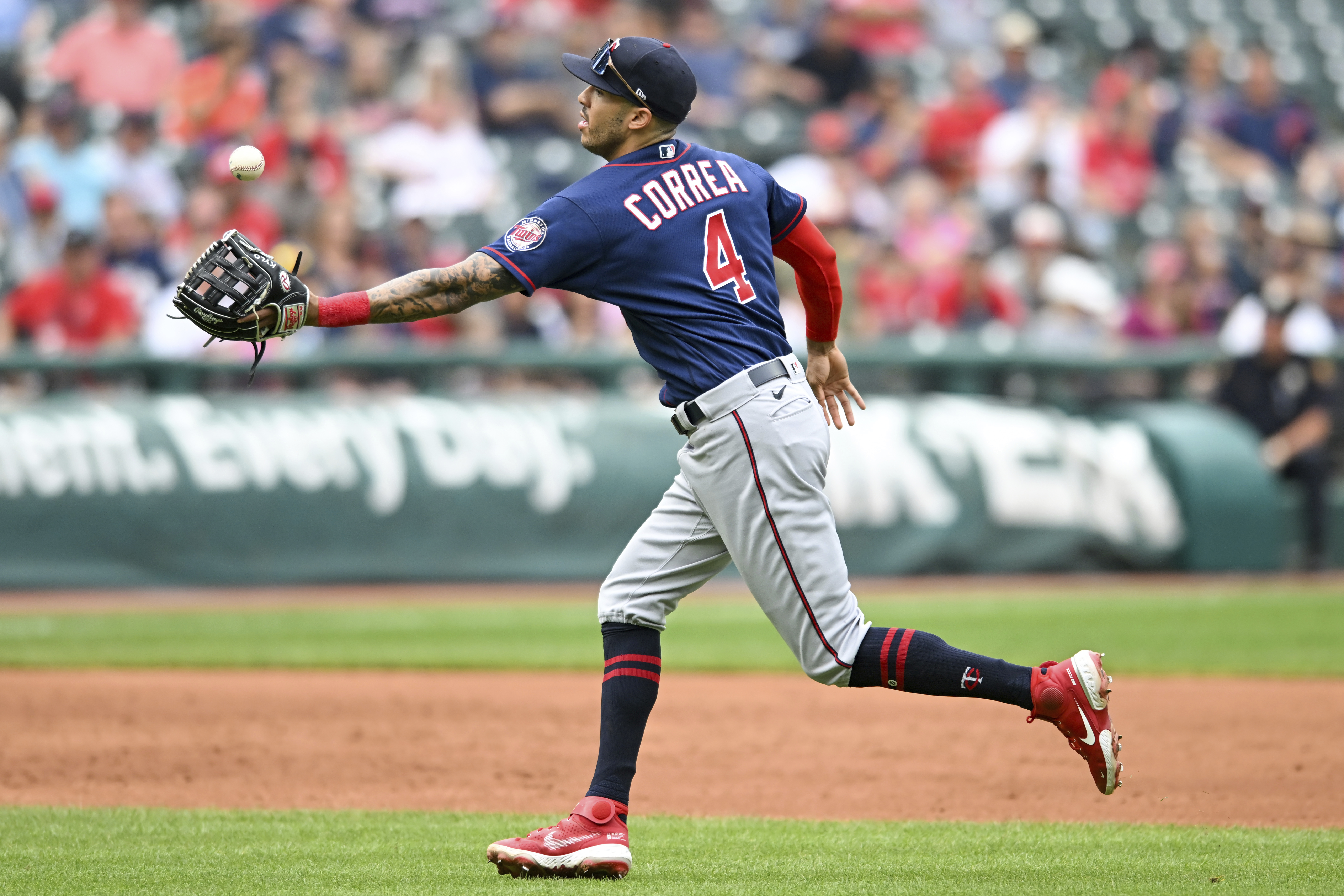 May 30, 2021: Carlos Correa (1) makes a throw to first base for