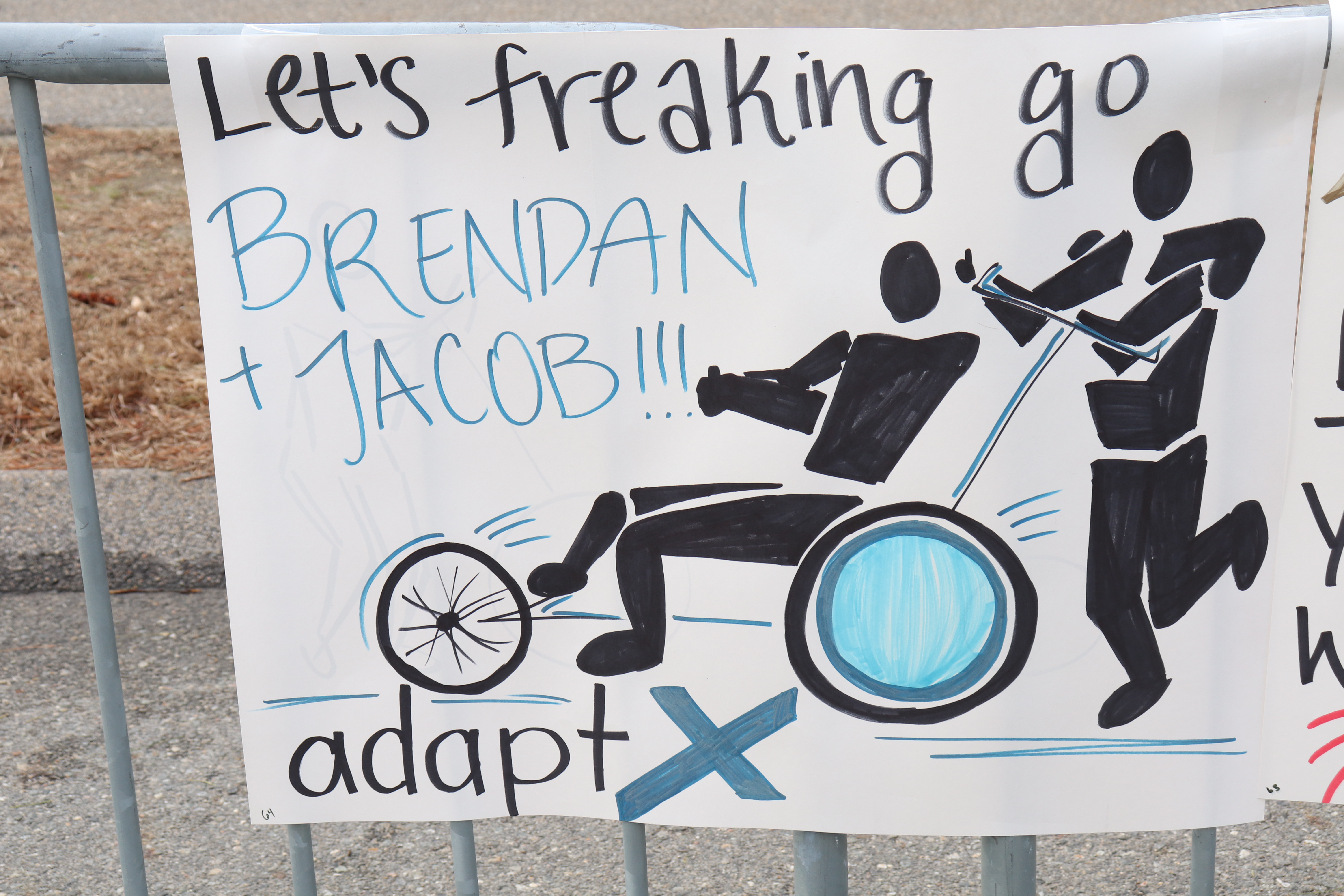 Creative signs along the 2024 Boston Marathon race route at Wellesley ...