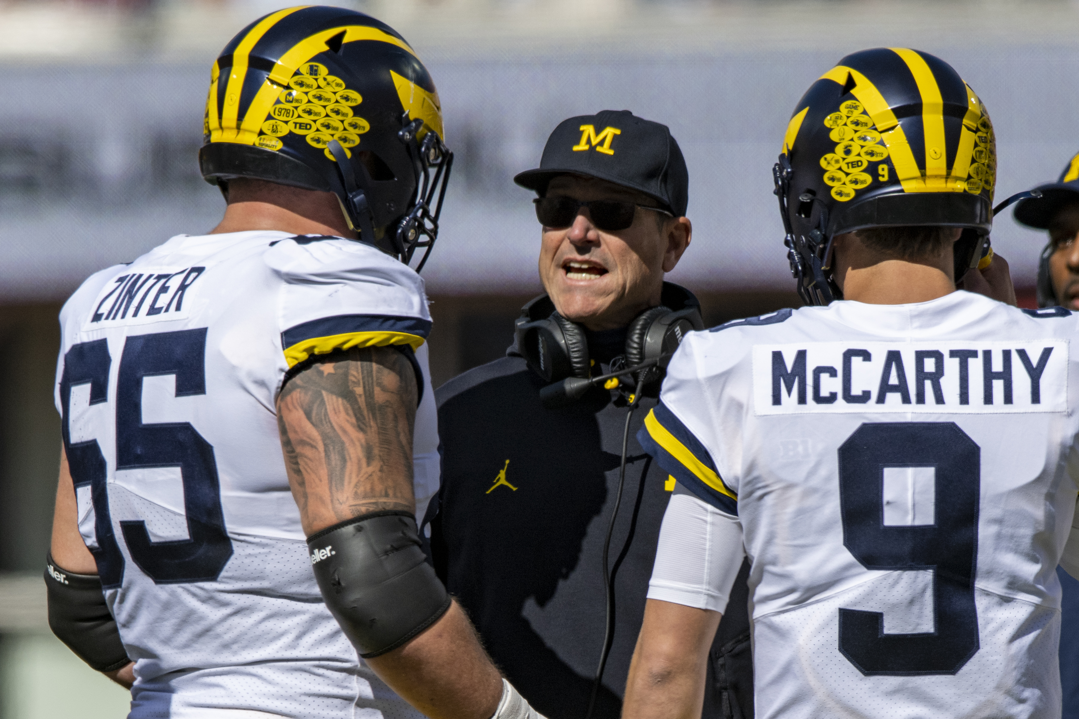 Michigan suspends OC Sherrone Moore for season opener against East