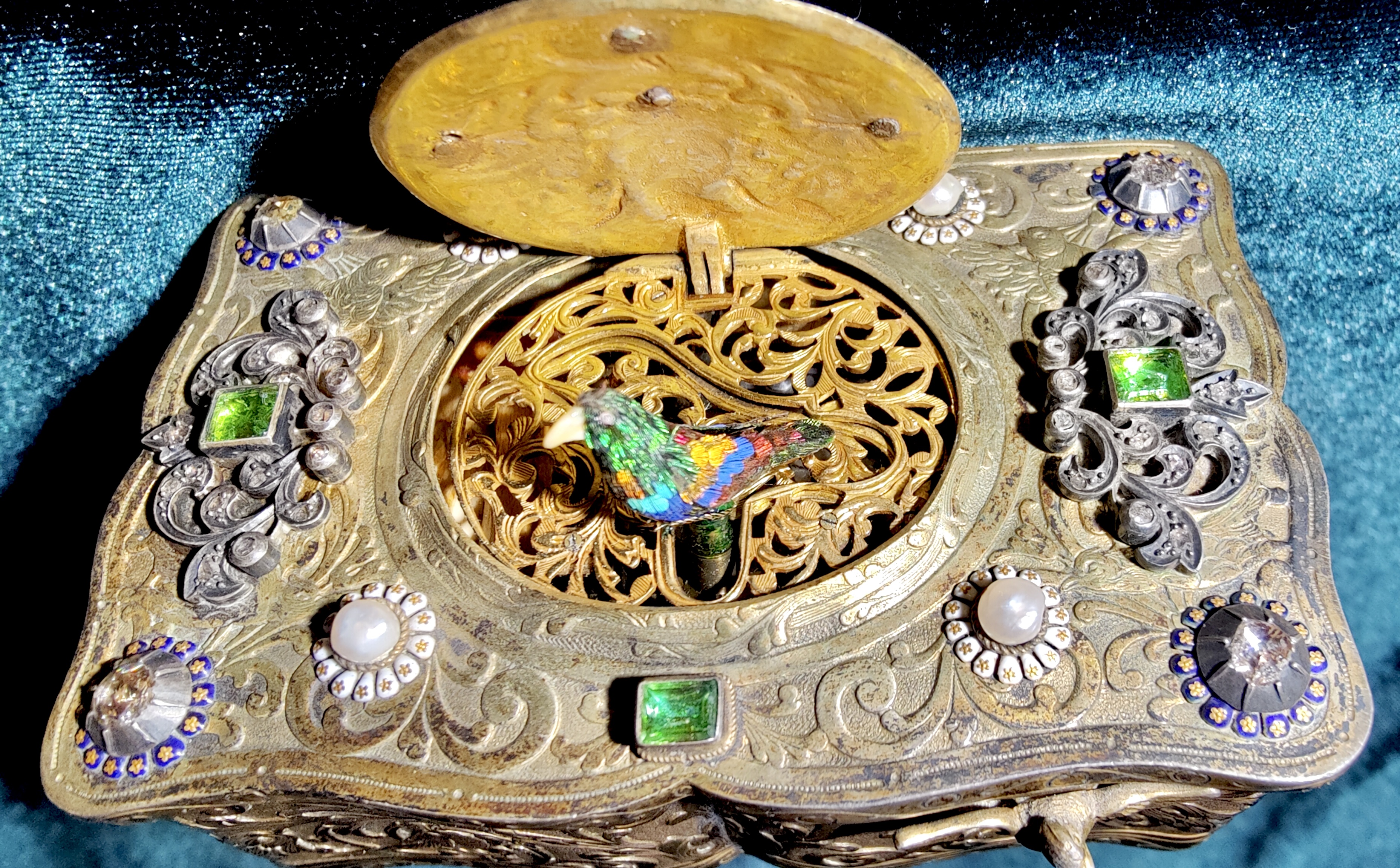 This jeweled box with a singing bird could be worth