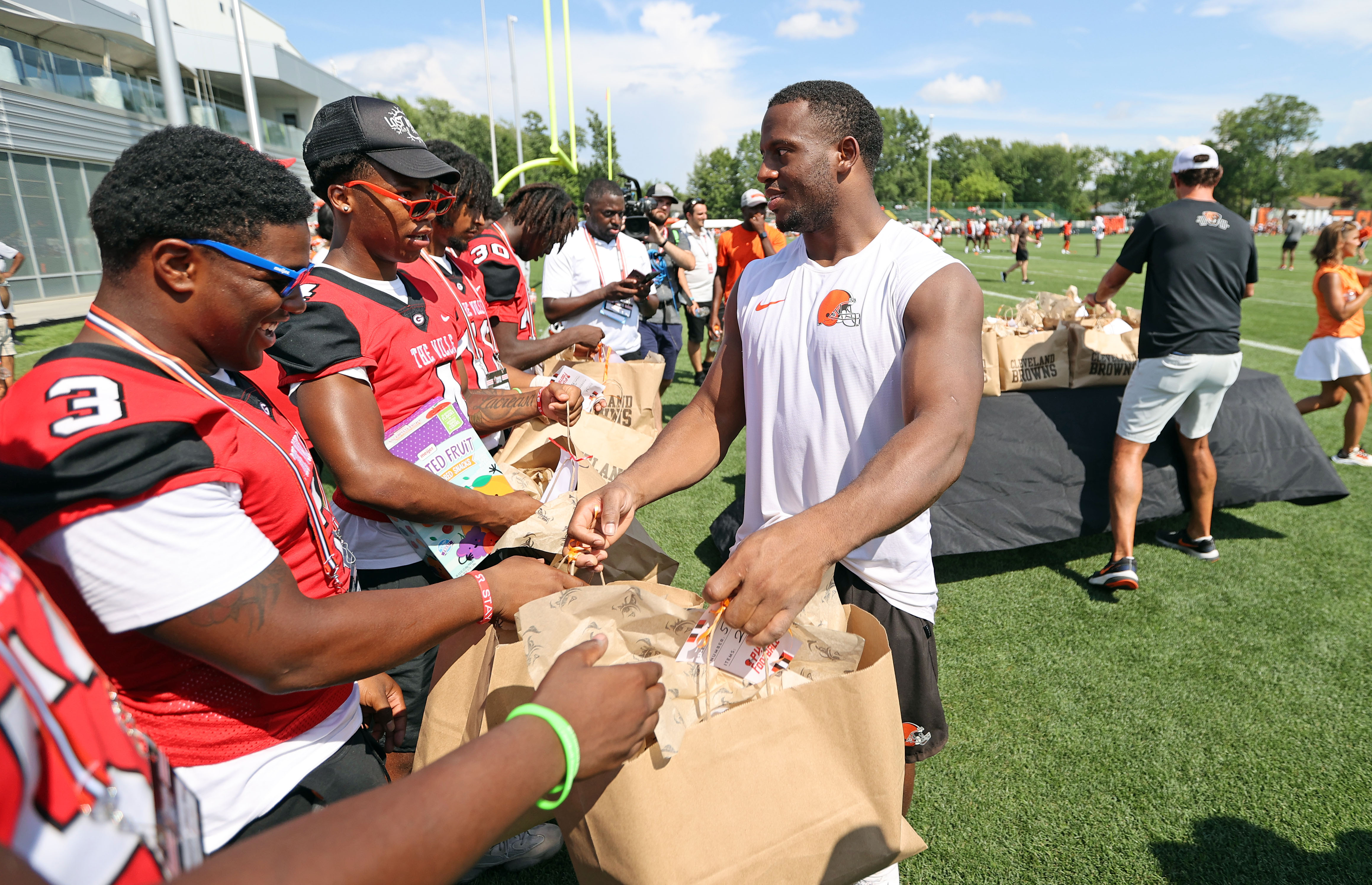 Cleveland Browns surprise Glenville and John Hay high school