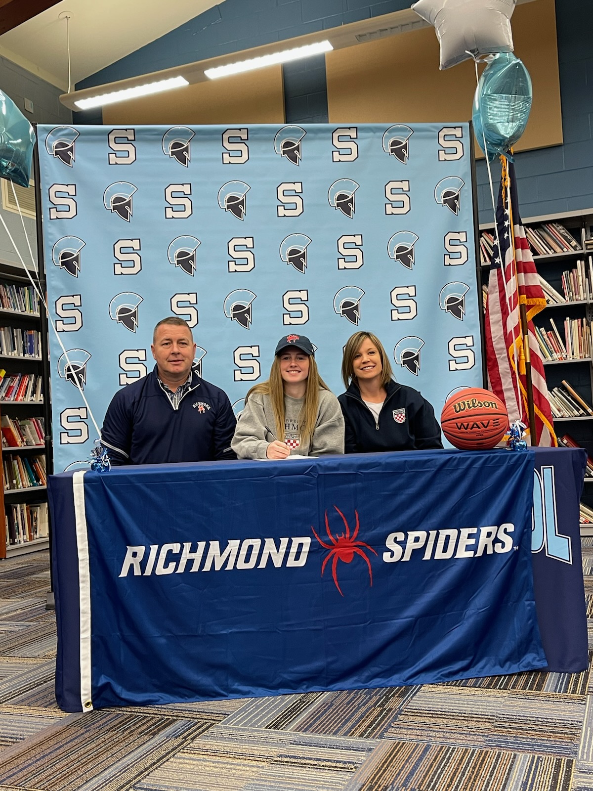 Ally Sweeney signs her NLI to play basketball at Richmond